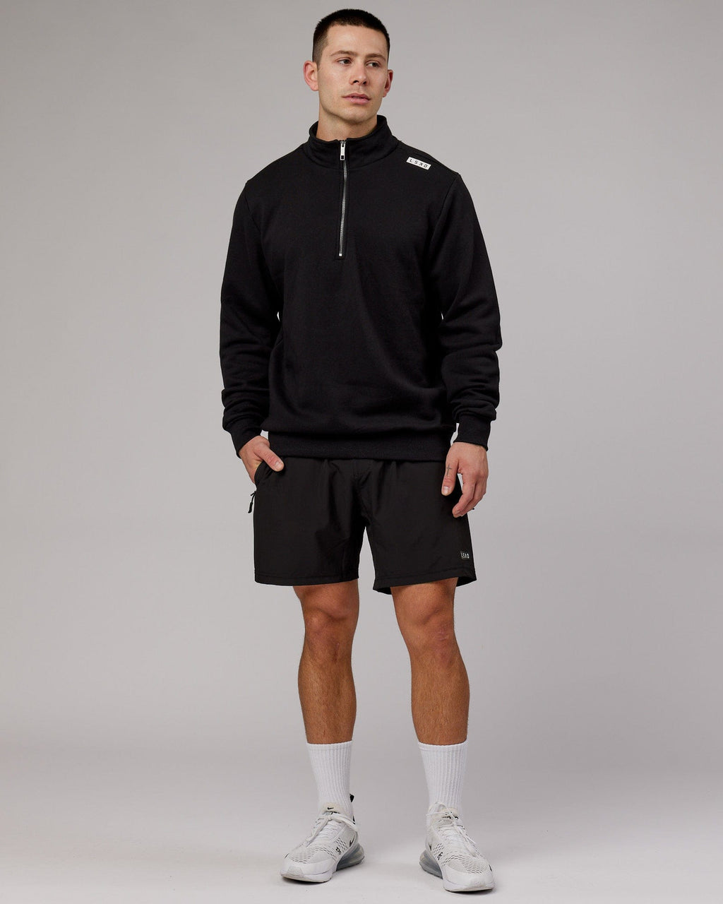 Model wearing Victory 1/4 Zip Sweater Oversize - Black