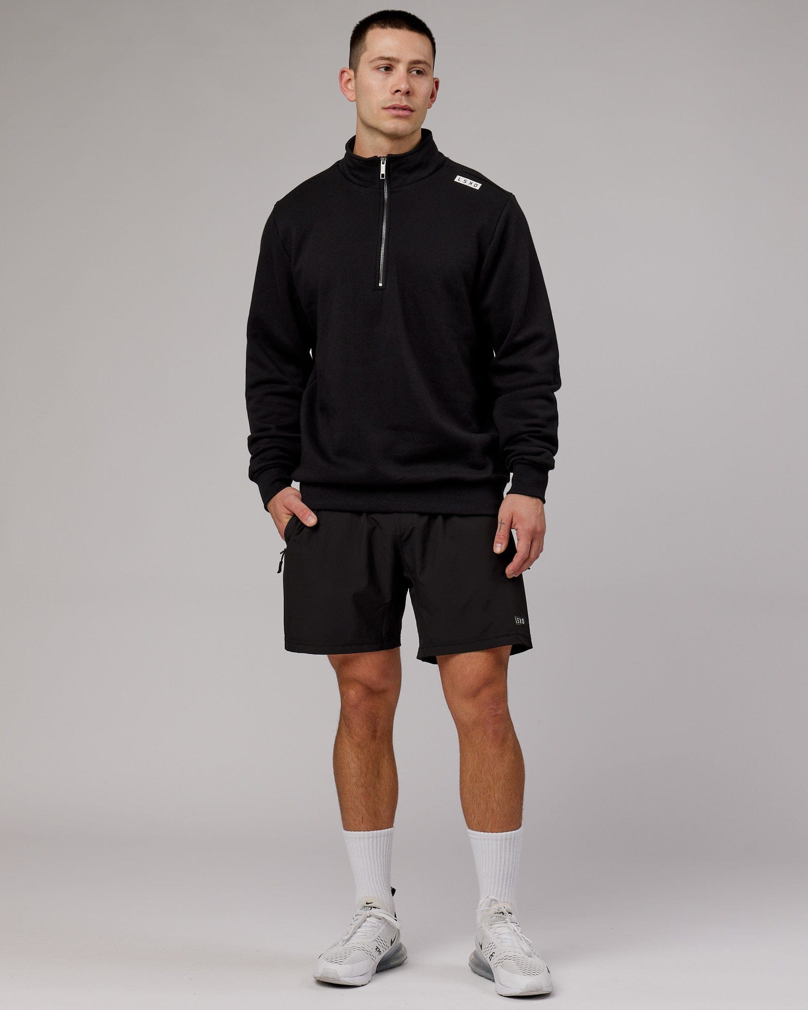 Model wearing Victory 1/4 Zip Sweater Oversize - Black