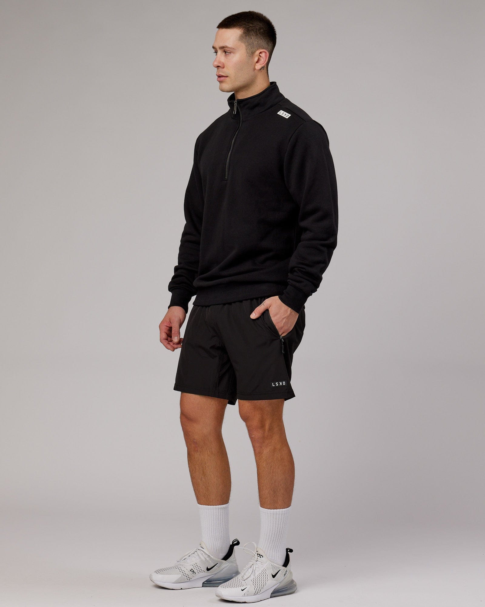 Model wearing Victory 1/4 Zip Sweater Oversize - Black