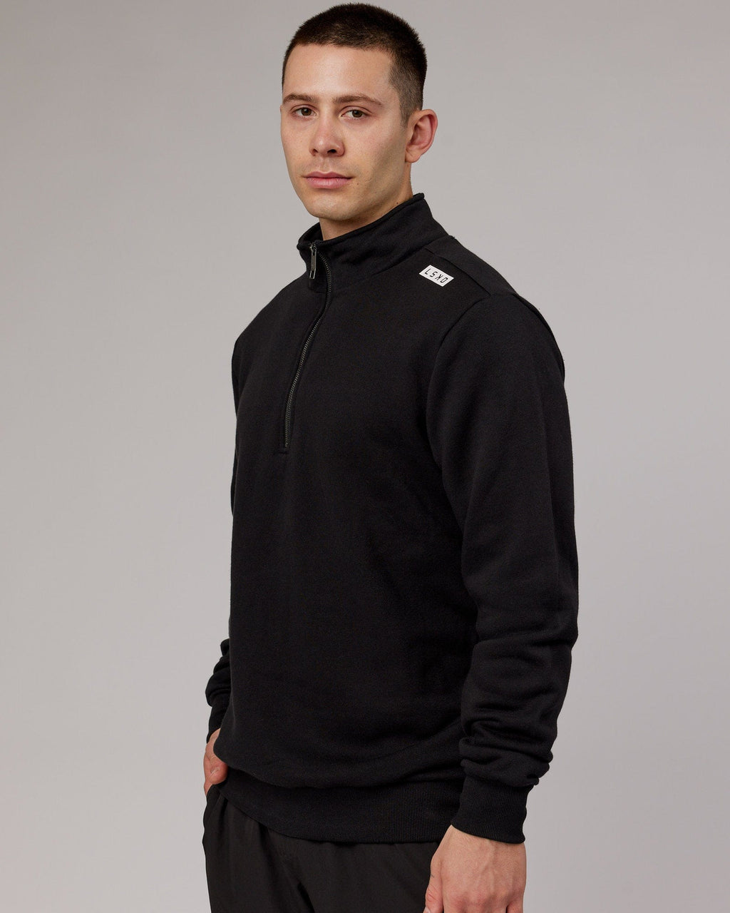 Model wearing Victory 1/4 Zip Sweater Oversize - Black