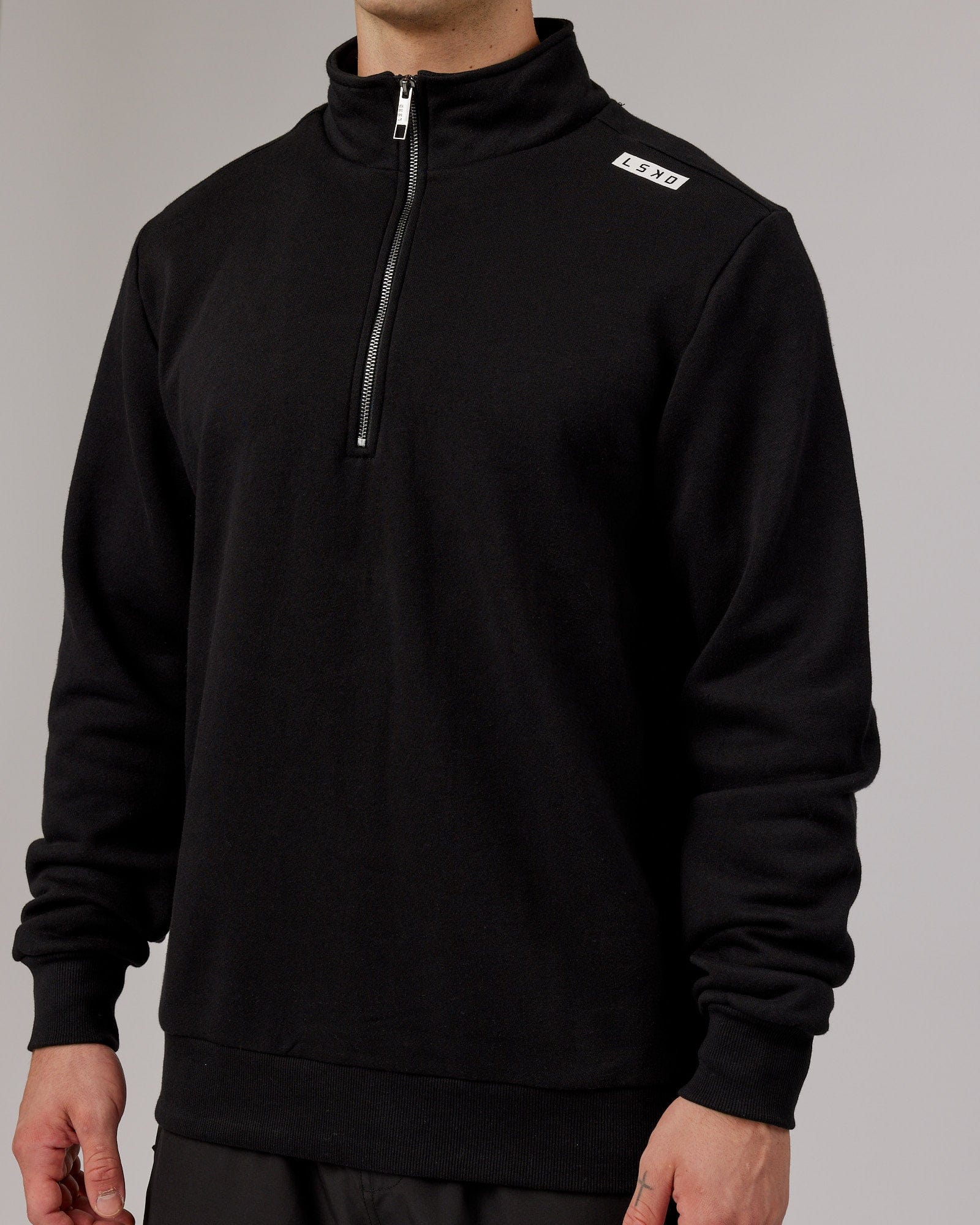 Model wearing Victory 1/4 Zip Sweater Oversize - Black