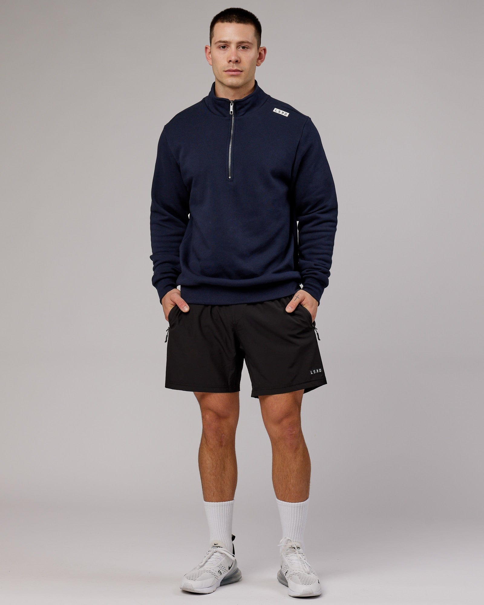 Model wearing Victory 1/4 Zip Sweater Oversize - Navy