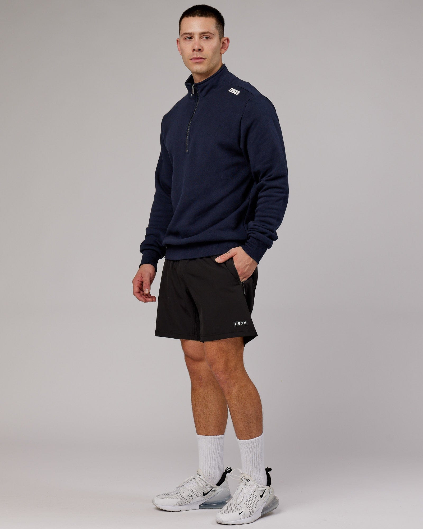 Model wearing Victory 1/4 Zip Sweater Oversize - Navy