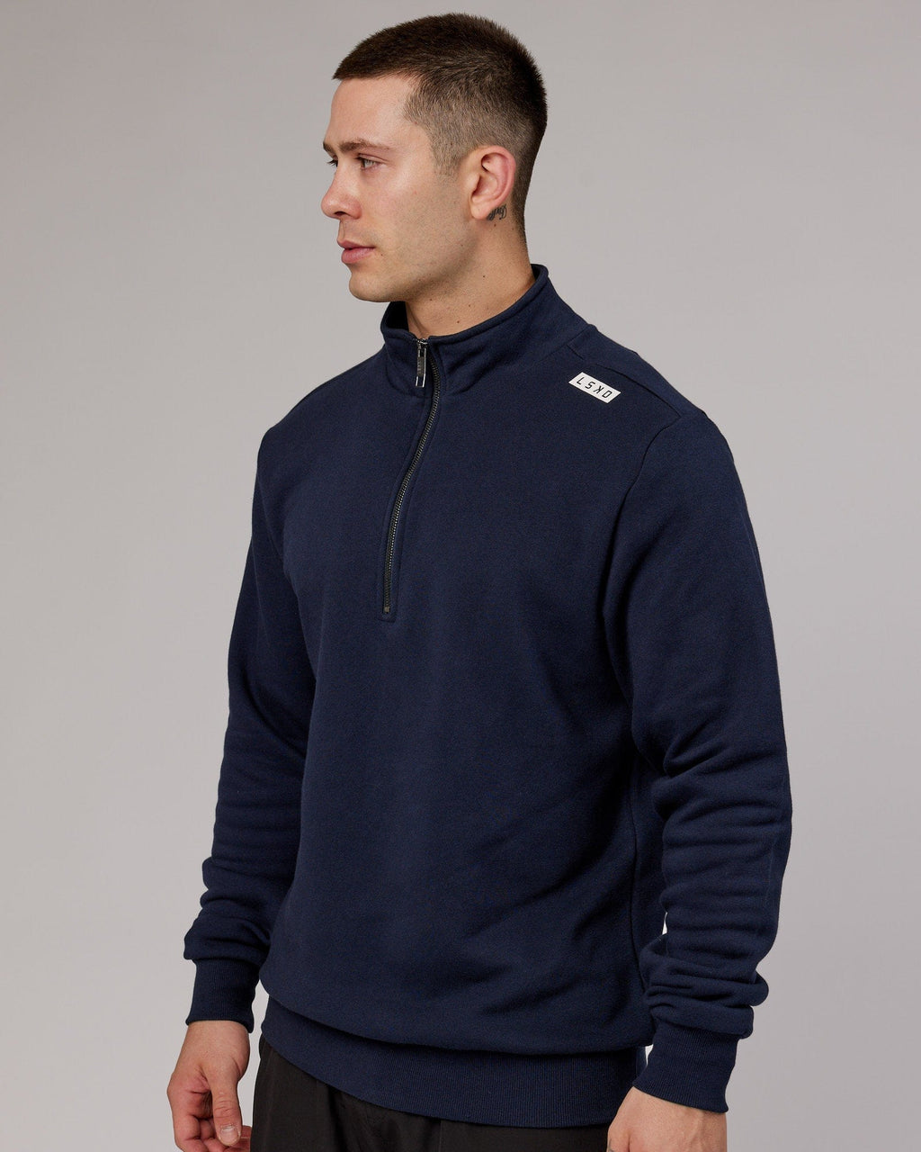 Model wearing Victory 1/4 Zip Sweater Oversize - Navy