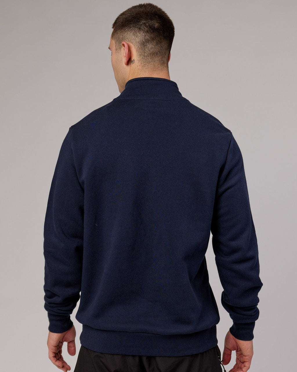 Model wearing Victory 1/4 Zip Sweater Oversize - Navy
