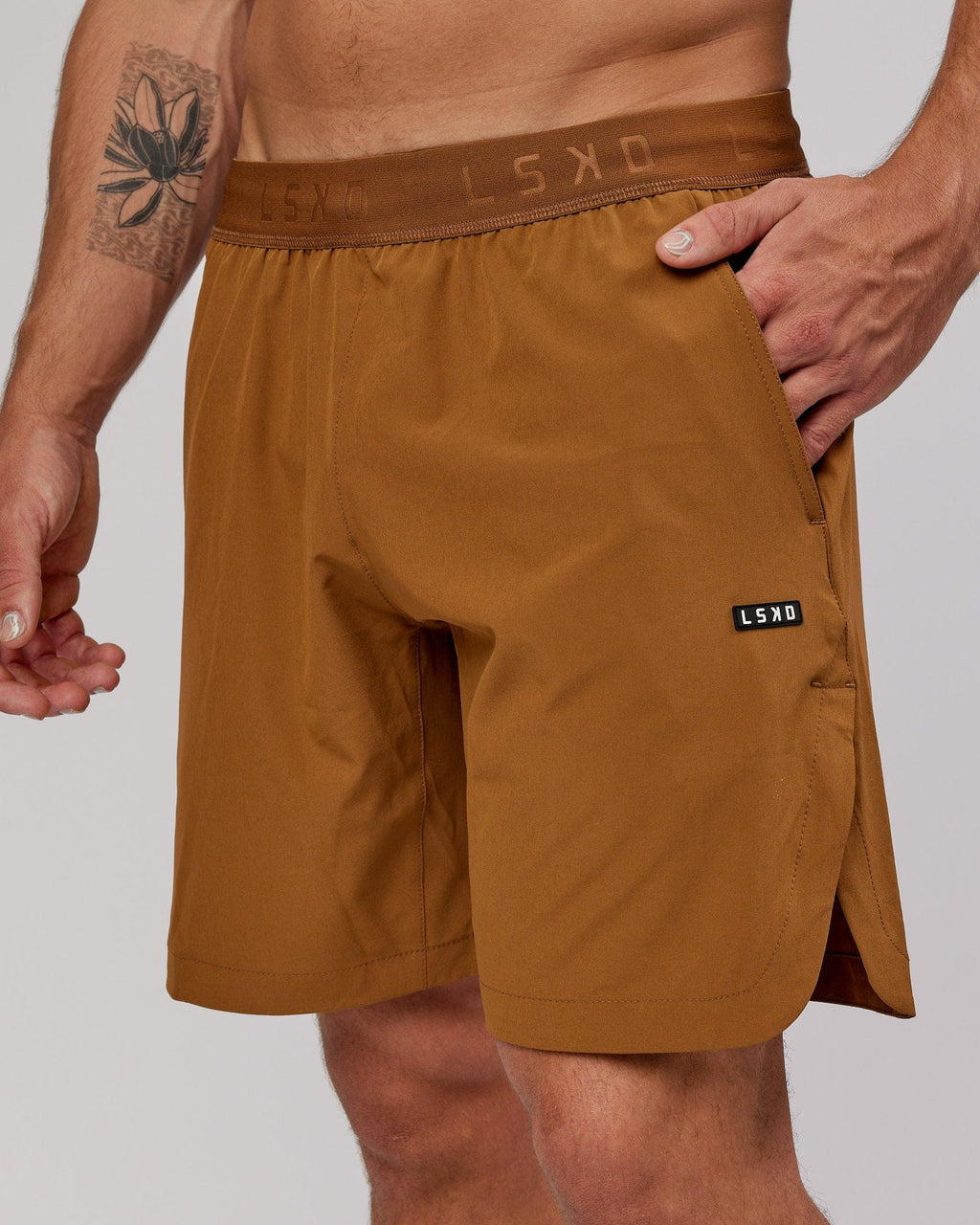 Model wearing Competition 8" Performance Short - Camel
