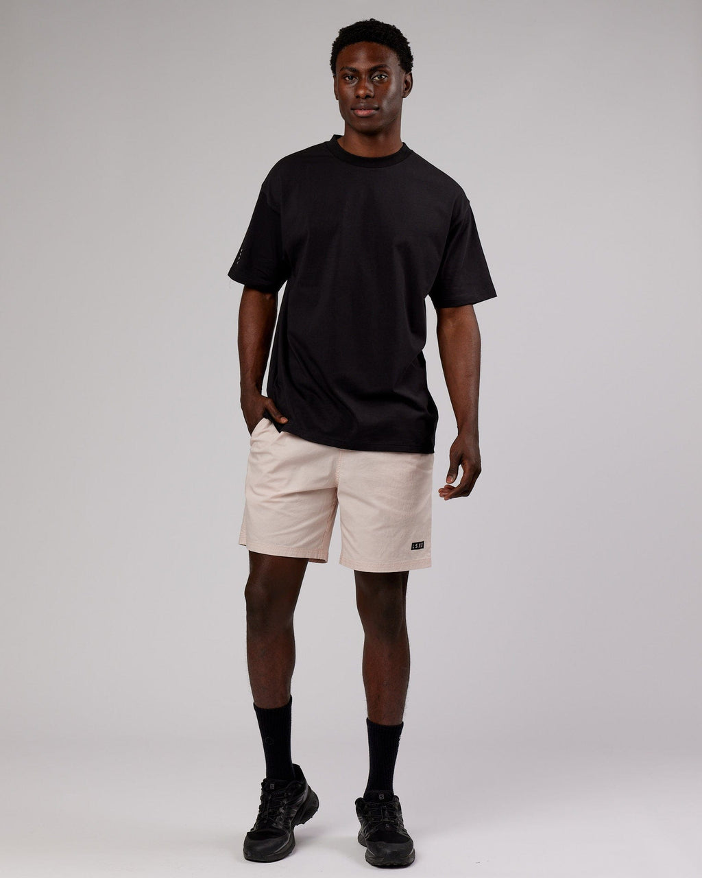 Model wearing LTRD FLXCotton Tee Oversize - Black-Pink