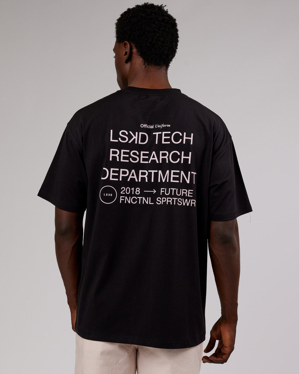 Model wearing LTRD FLXCotton Tee Oversize - Black-Pink