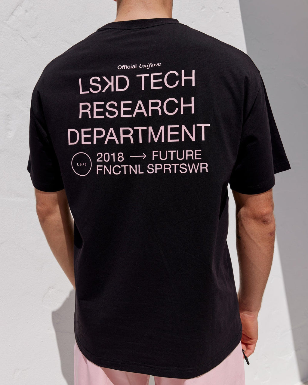 Model wearing LTRD FLXCotton Tee Oversize - Black-Pink