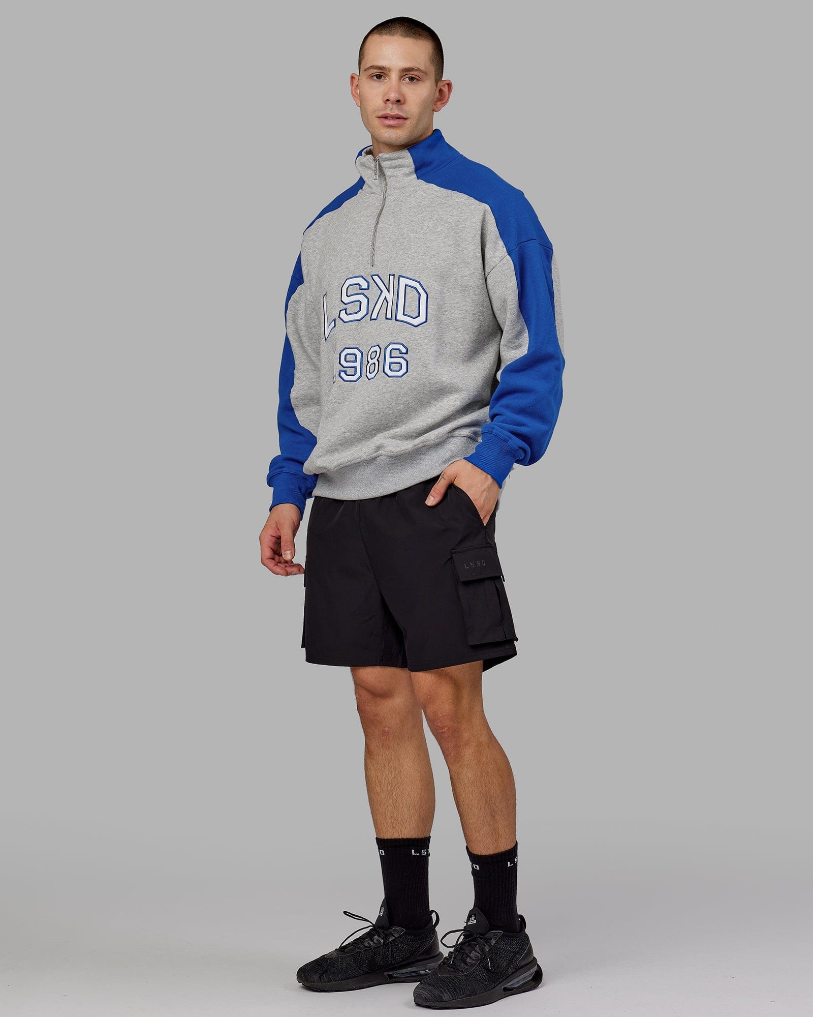 Model wearing Alumni 1/4 Zip Sweater Oversize - Grey-Blue