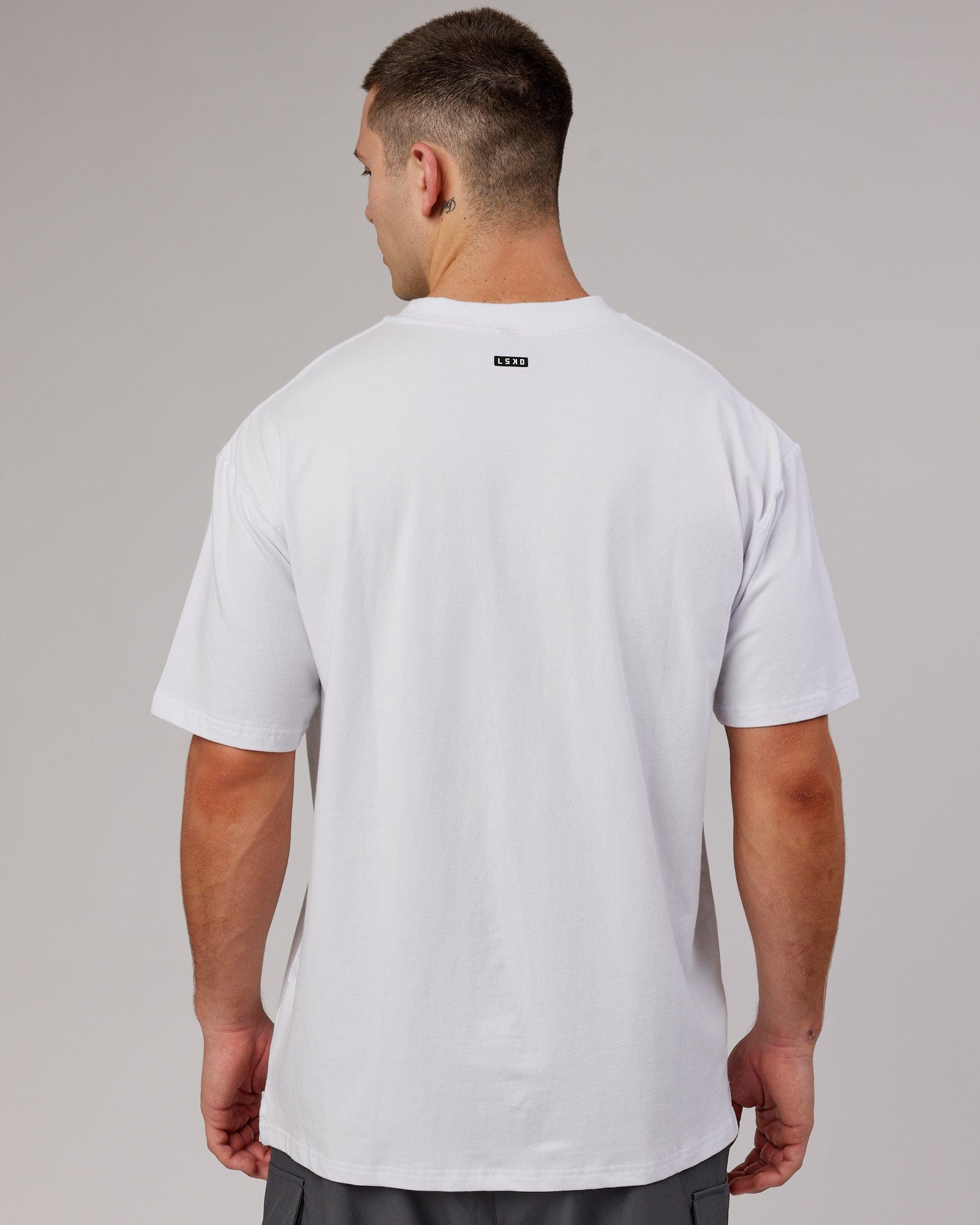 Model wearing Capsule FLXCotton Tee Oversize - White