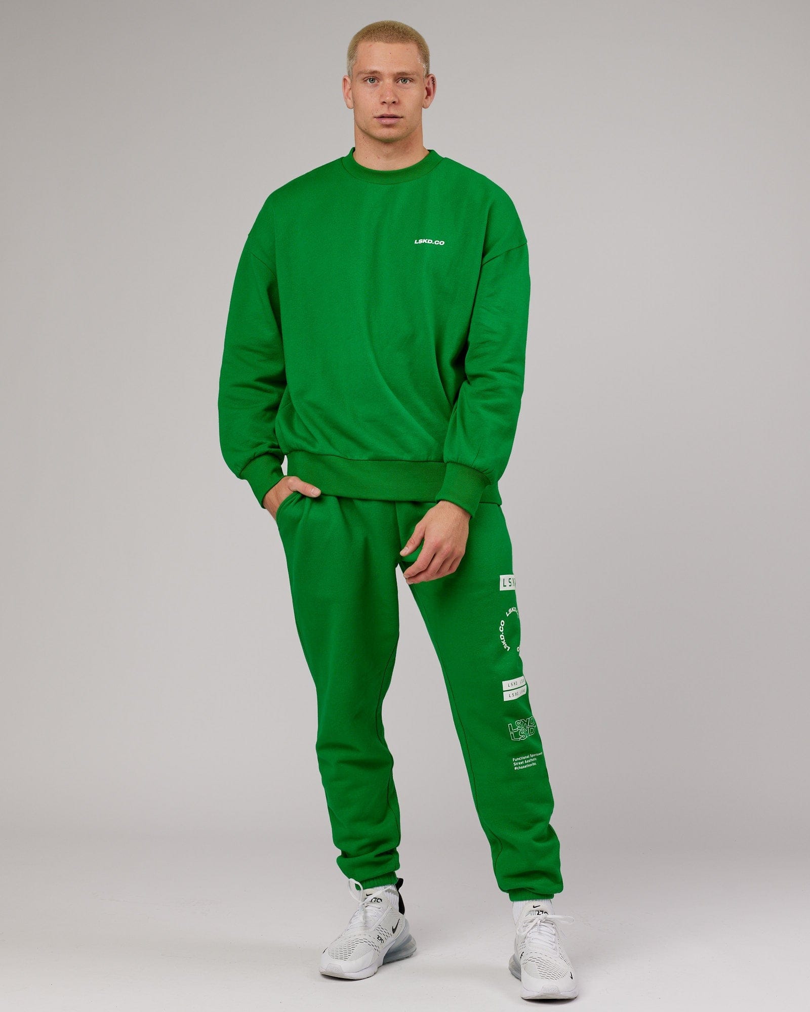 Model wearing Combo Track Pant - Vivid Green