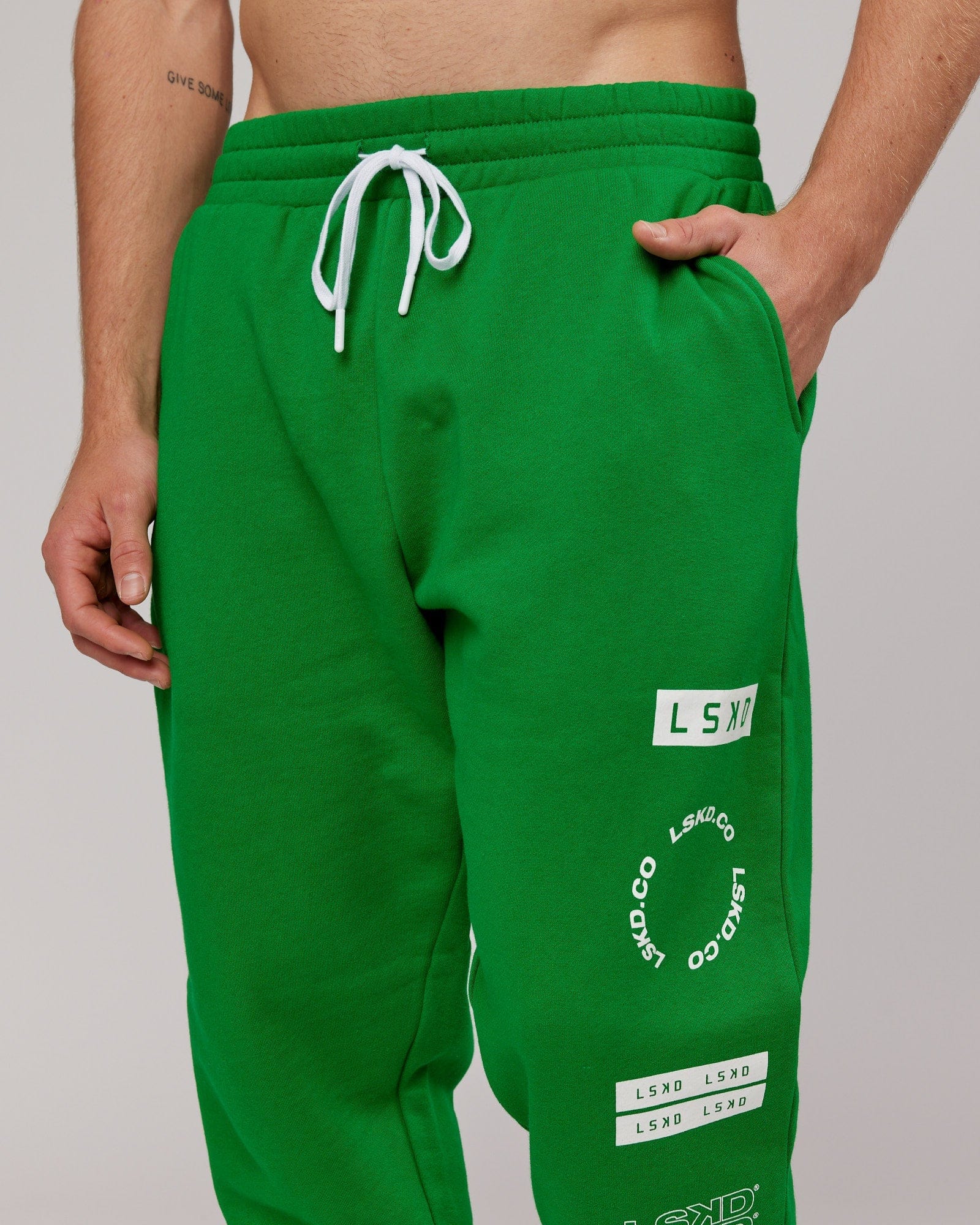 Model wearing Combo Track Pant - Vivid Green