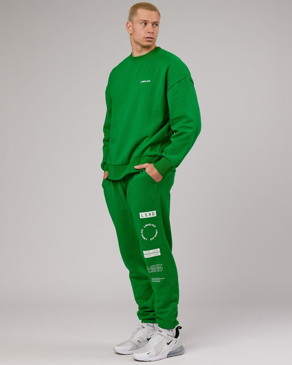 Model wearing Combo Track Pant - Vivid Green