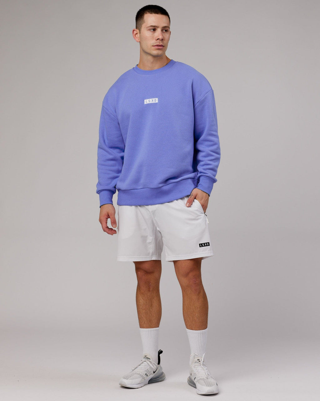Model wearing Cornerstone Sweater Oversize - Cornflower Blue