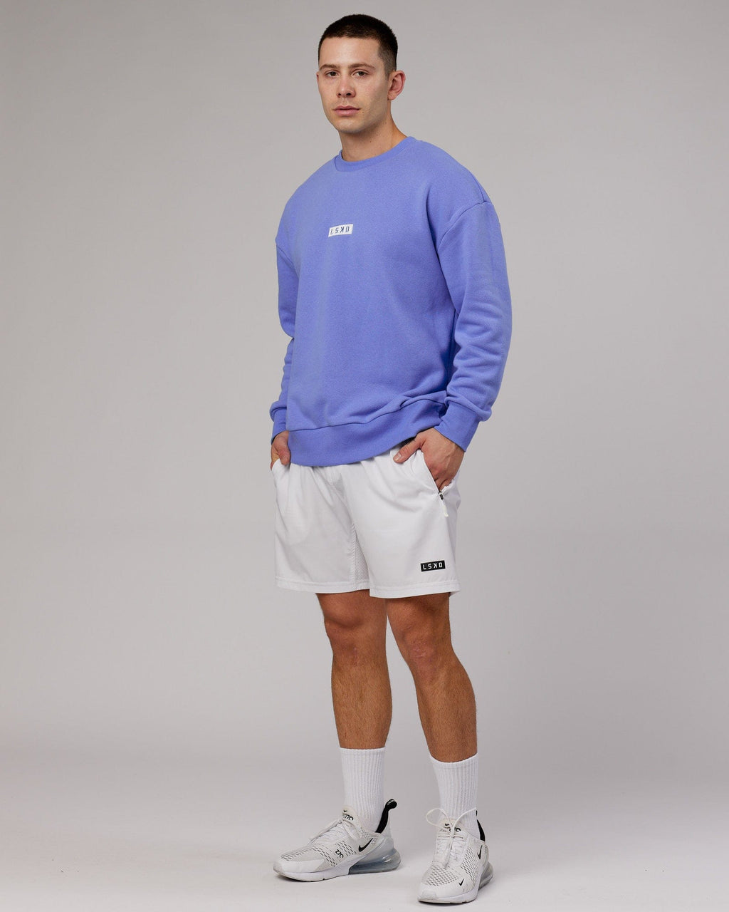 Model wearing Cornerstone Sweater Oversize - Cornflower Blue