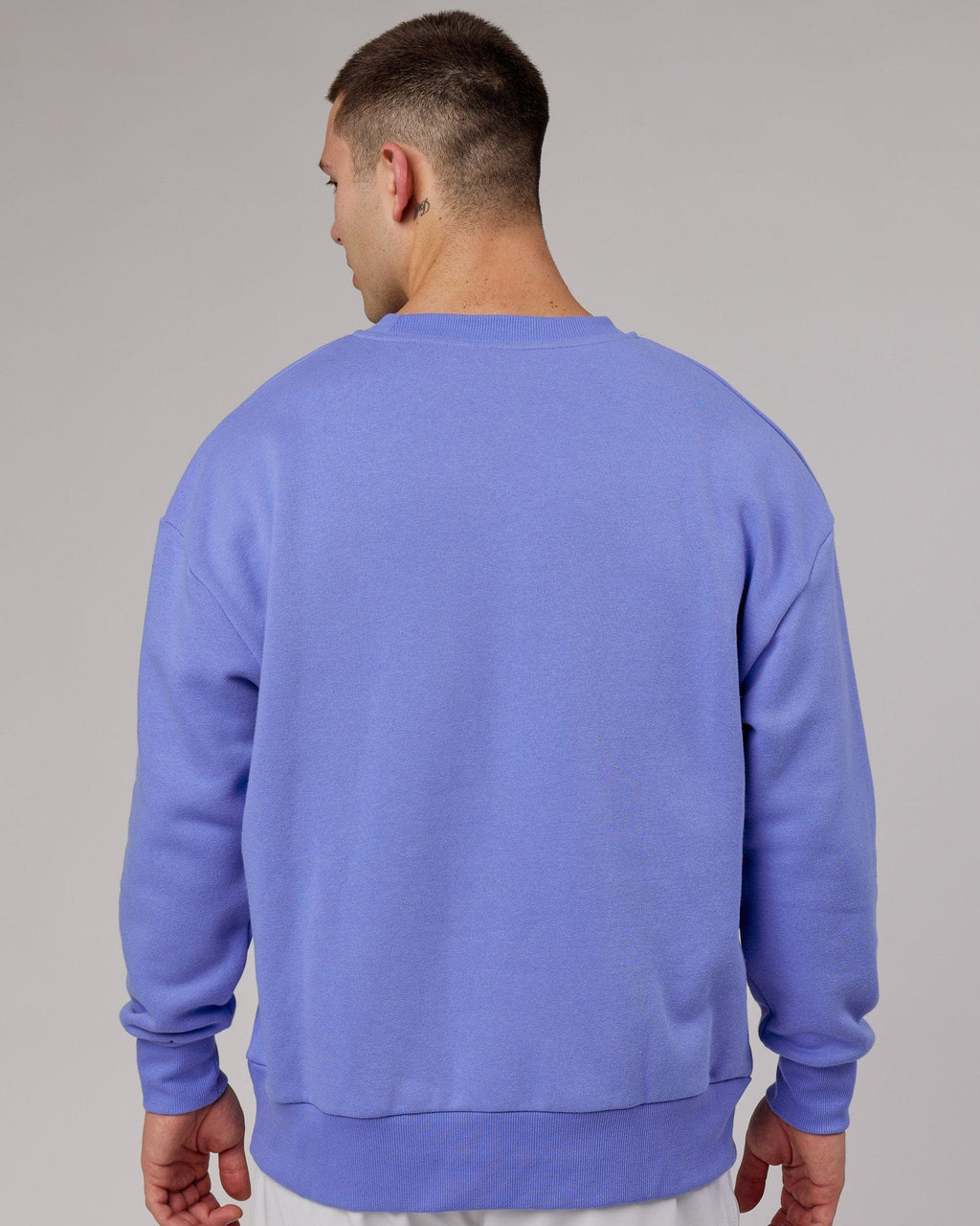 Model wearing Cornerstone Sweater Oversize - Cornflower Blue
