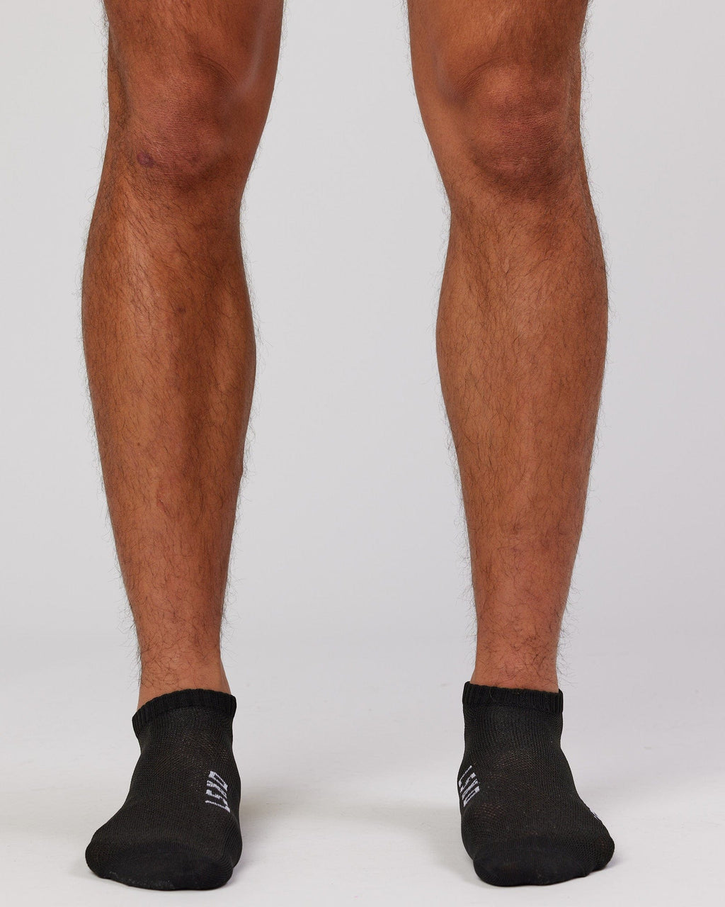 Model wearing Mens 3 Pack Covert Ankle Sock - Black