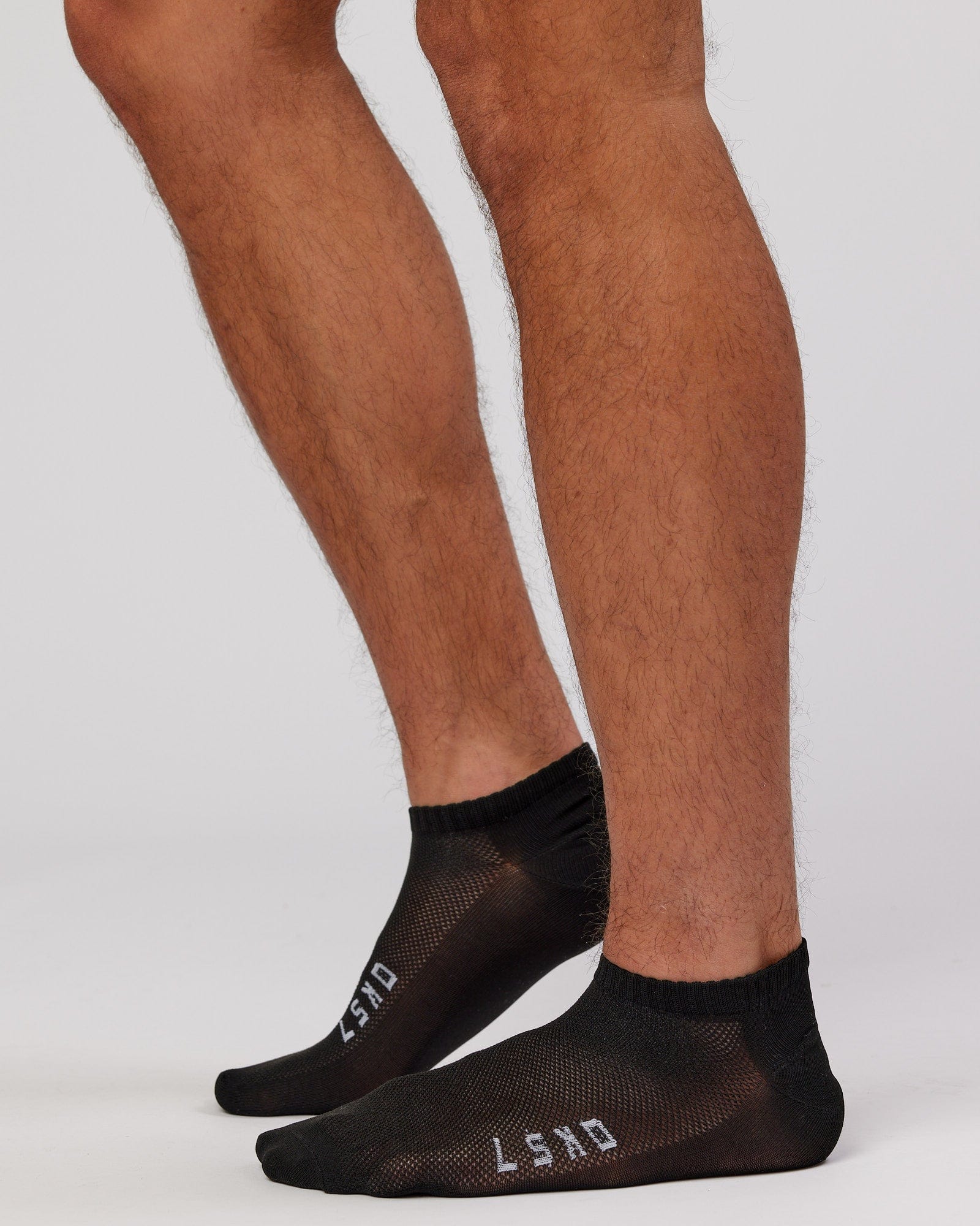 Model wearing Mens 3 Pack Covert Ankle Sock - Black