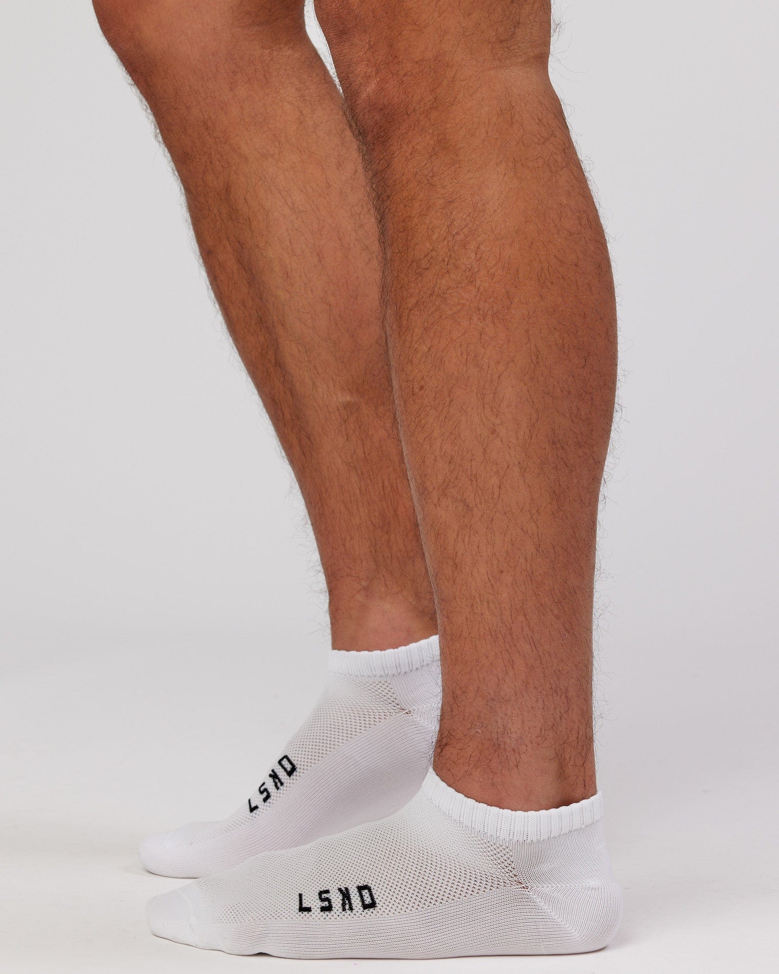 Model wearing Mens 3 Pack Covert Ankle Sock - White