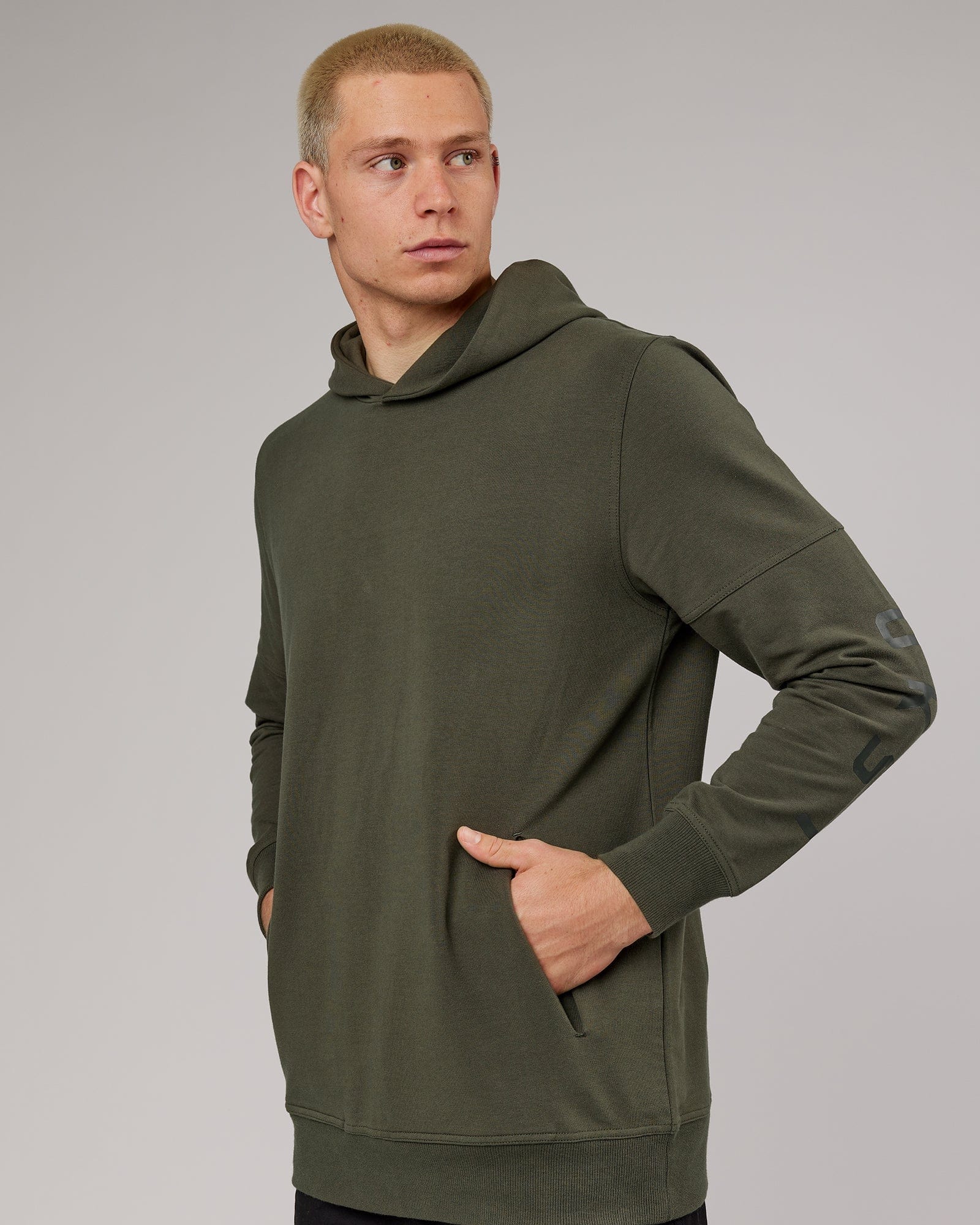 Model wearing Direction FLXFleece Hoodie - Forest Night