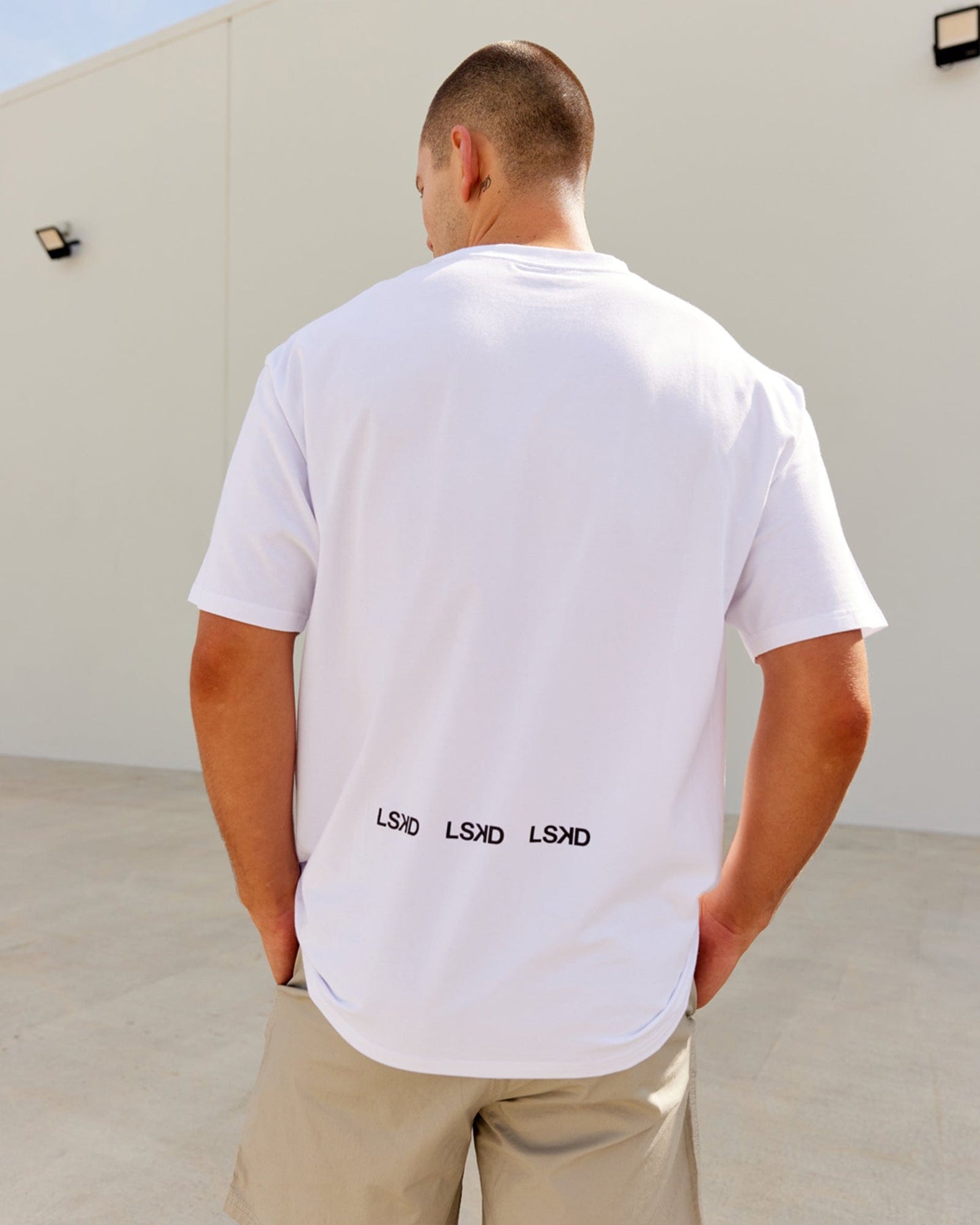 Model wearing DownLow FLXCotton Oversize Tee - White