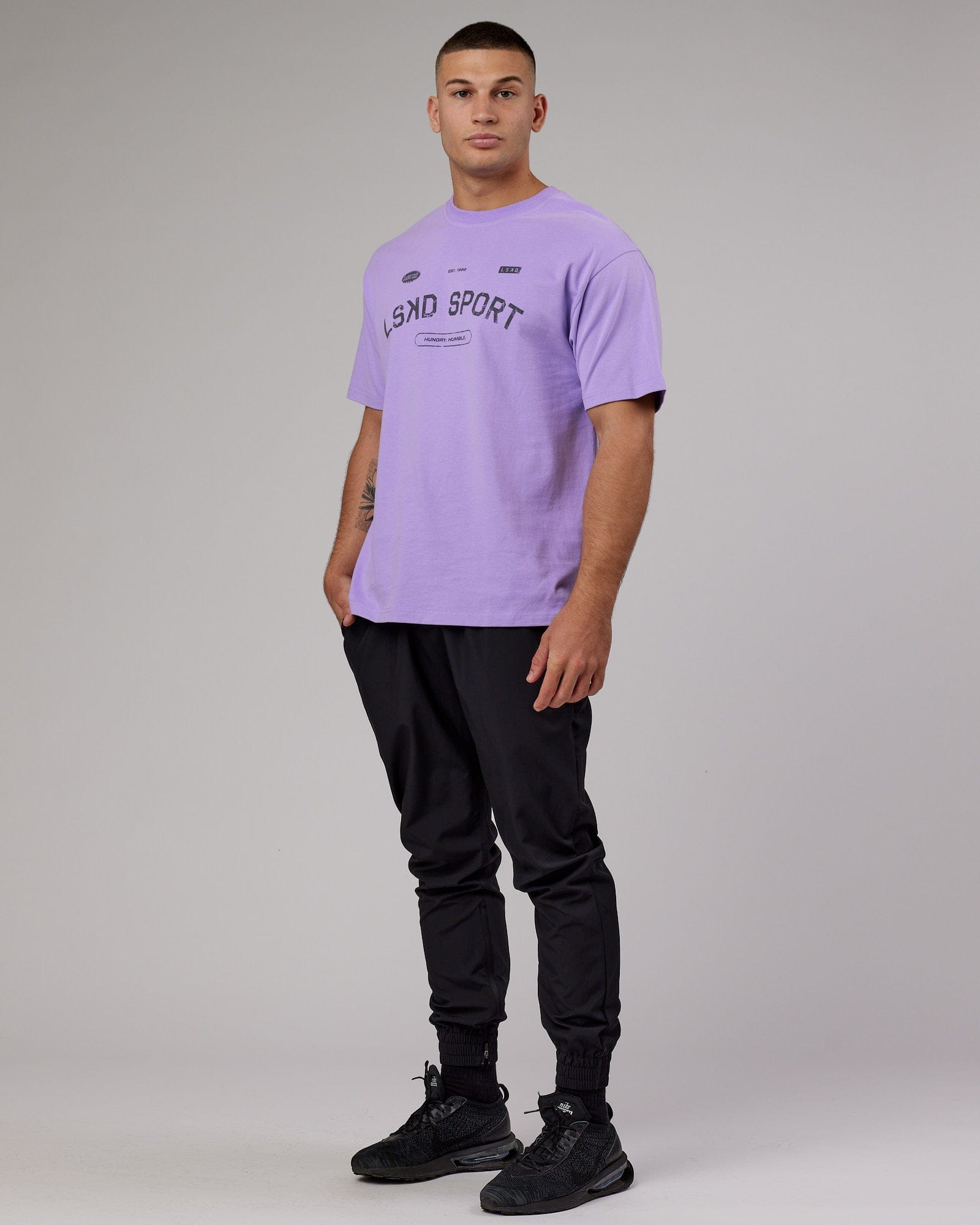 Model wearing Free Throw Heavyweight Tee Oversize - Peak Purple