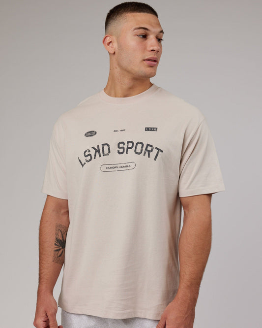 Model wearing Free Throw Heavyweight Tee Oversize - Shale Biege