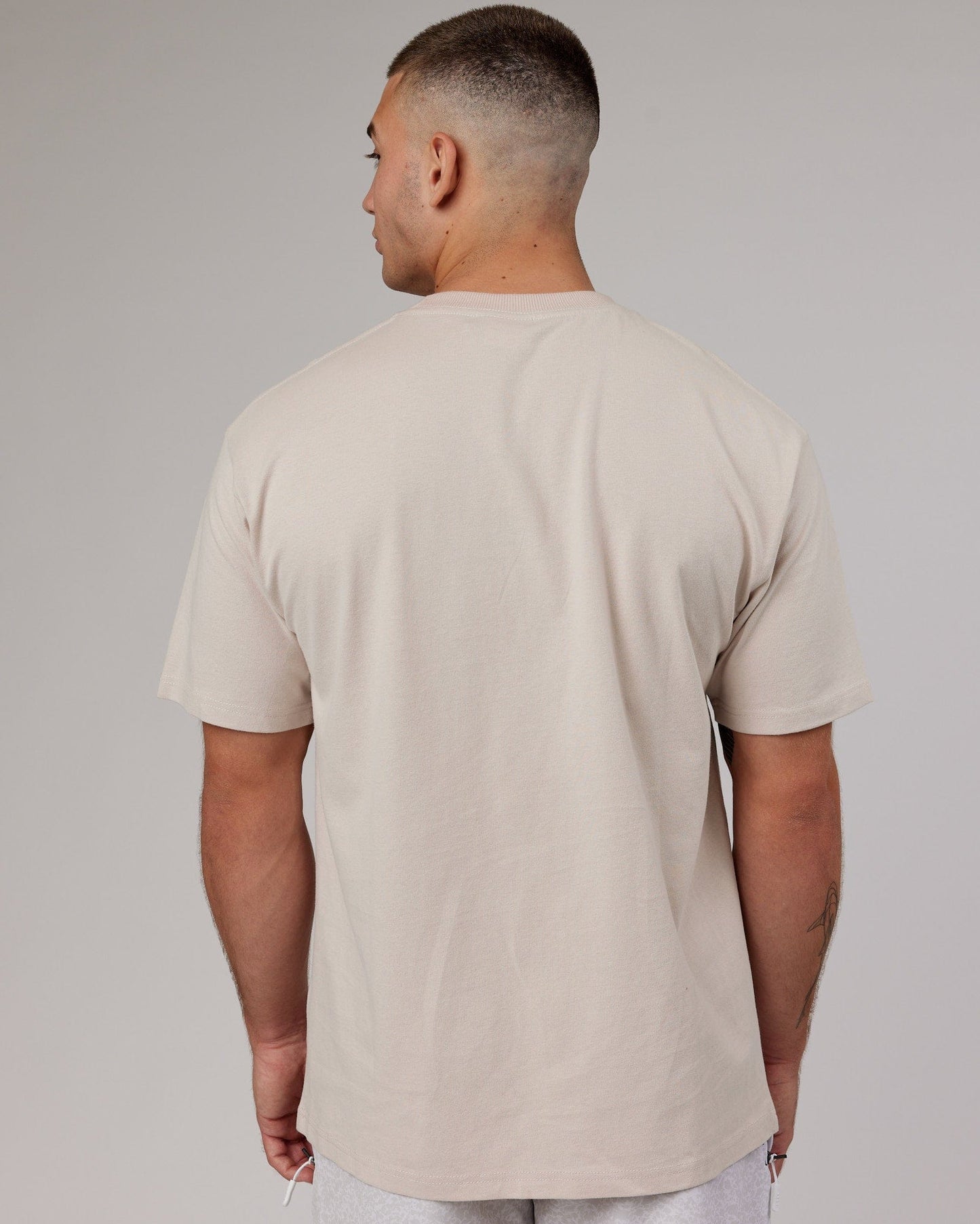 Model wearing Free Throw Heavyweight Tee Oversize - Shale Biege