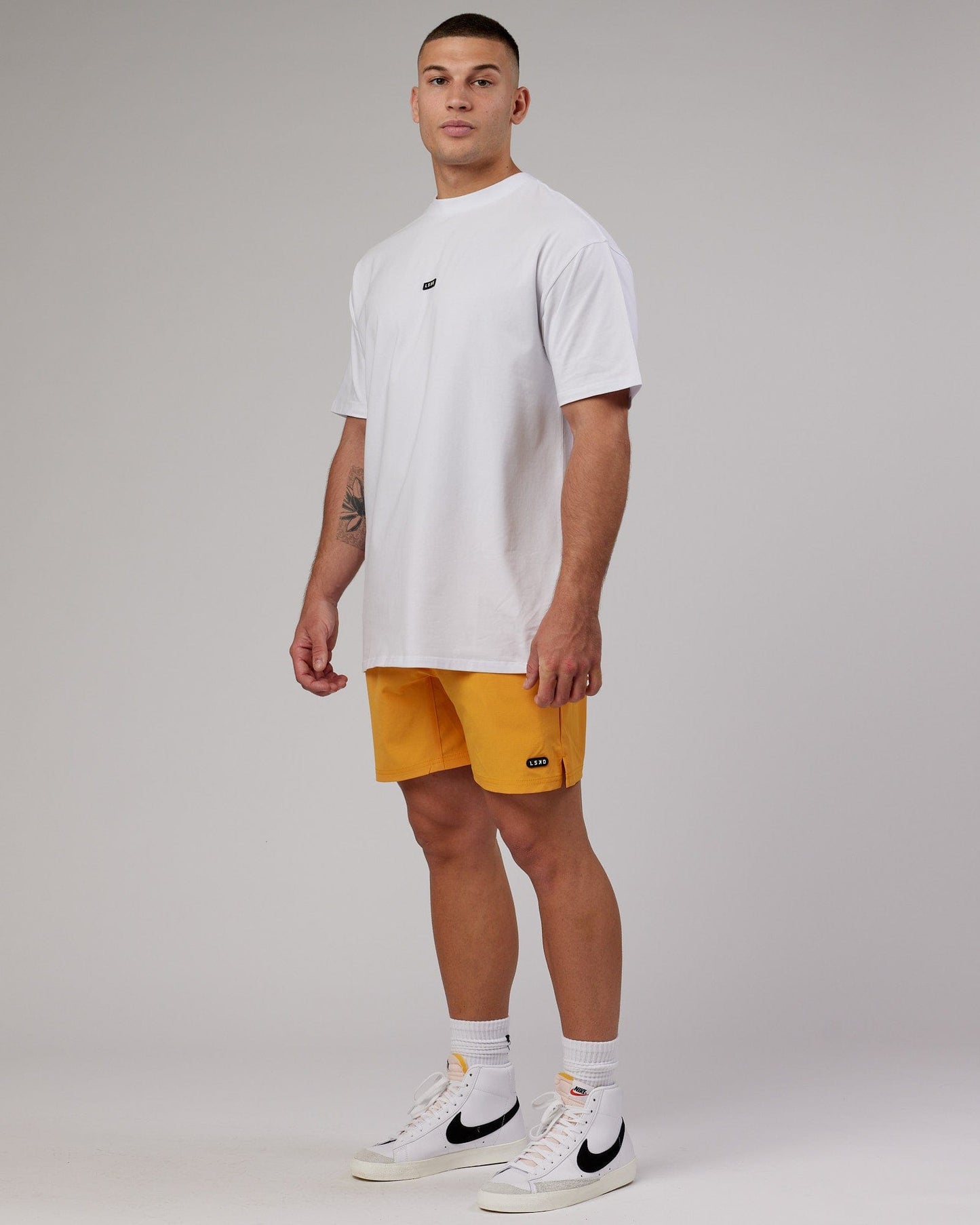 Model wearing Fundamental FLXCotton Tee Longline Oversize - White