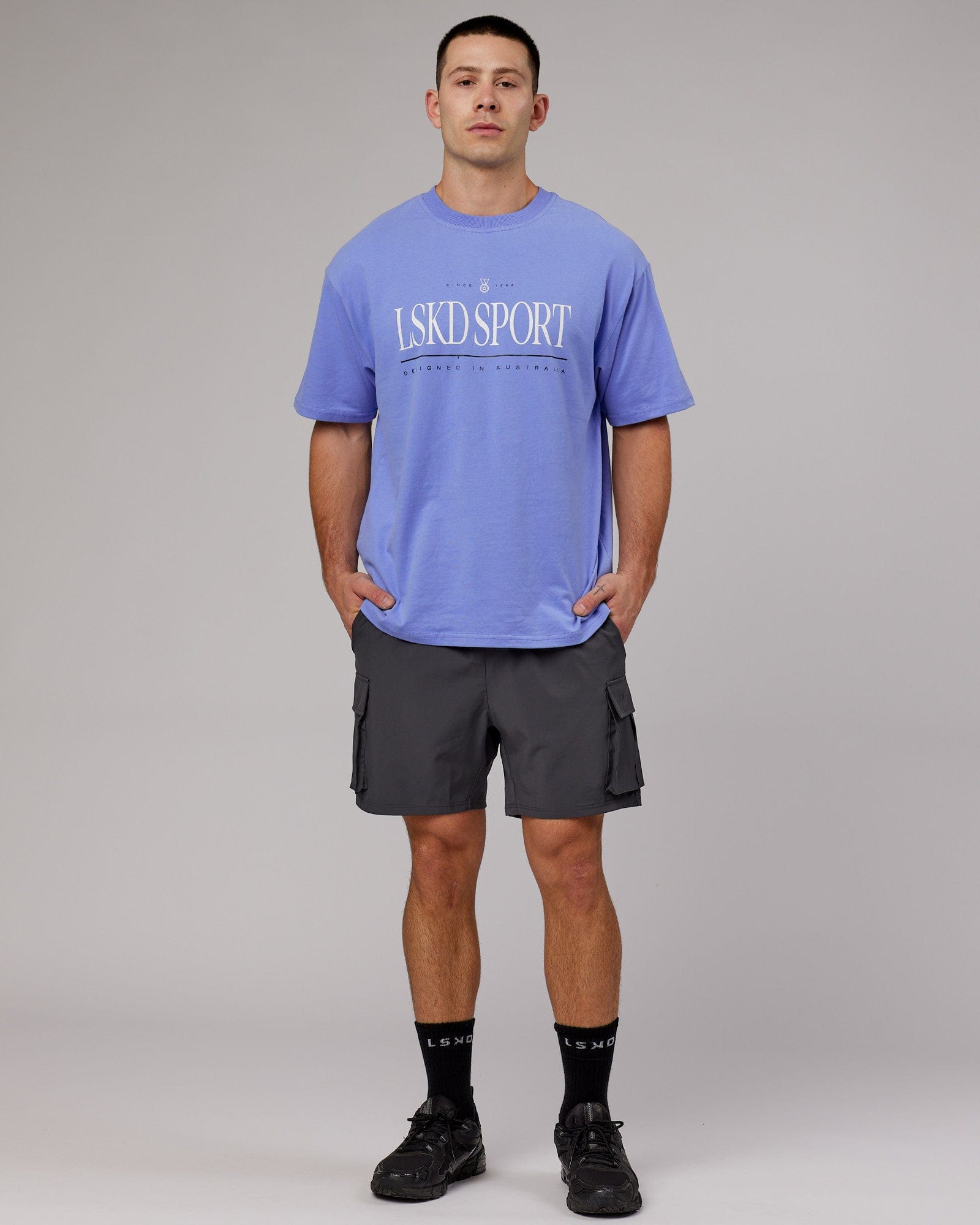 Model wearing Unisex Heritage Heavyweight Tee Oversize - Cornflower Blue