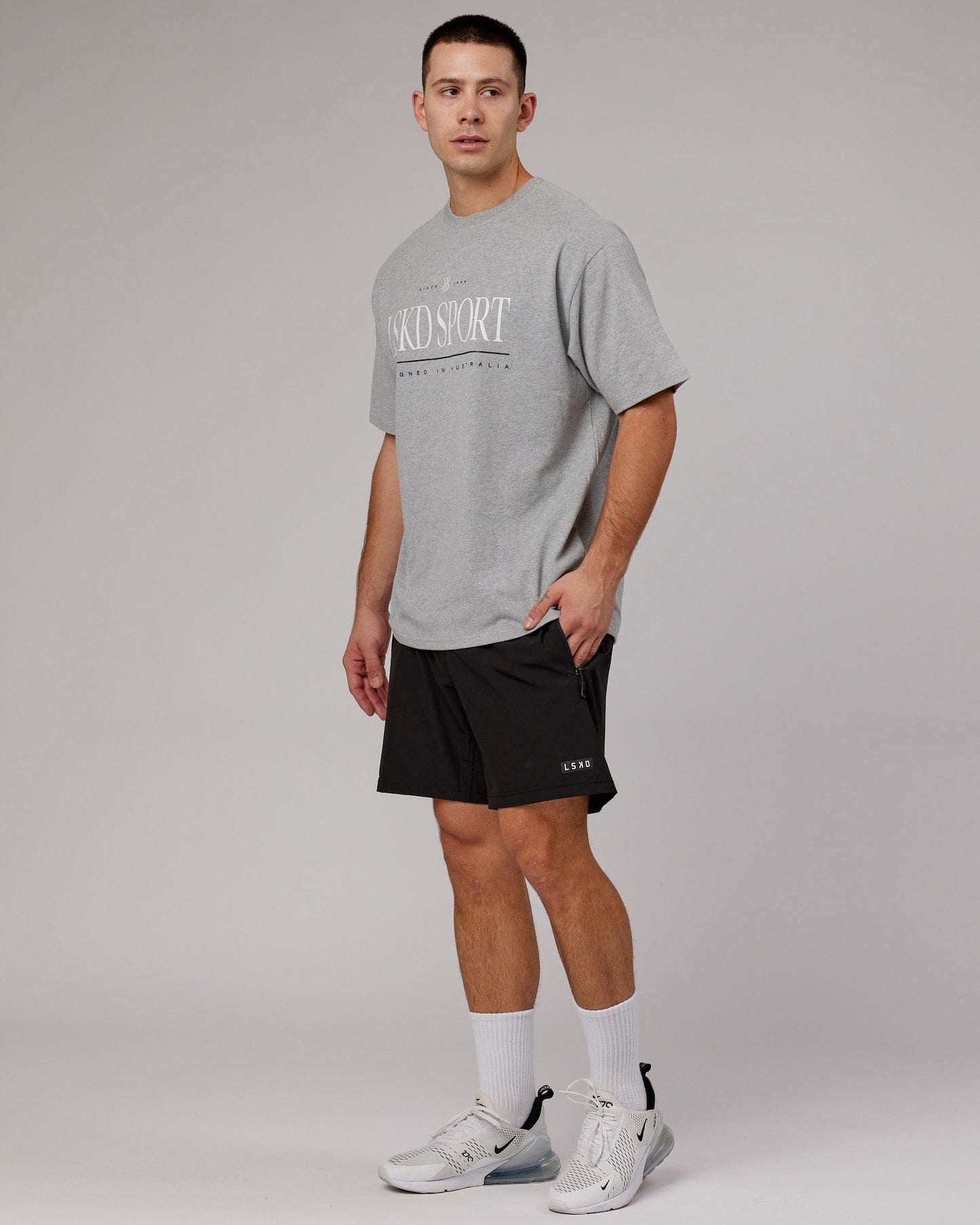 Model wearing Heritage Heavyweight Tee Oversize - Lt Grey Marl