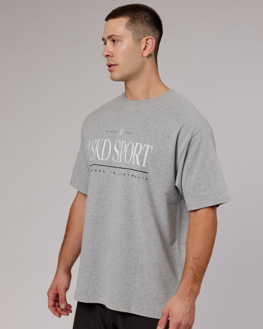 Model wearing Heritage Heavyweight Tee Oversize - Lt Grey Marl
