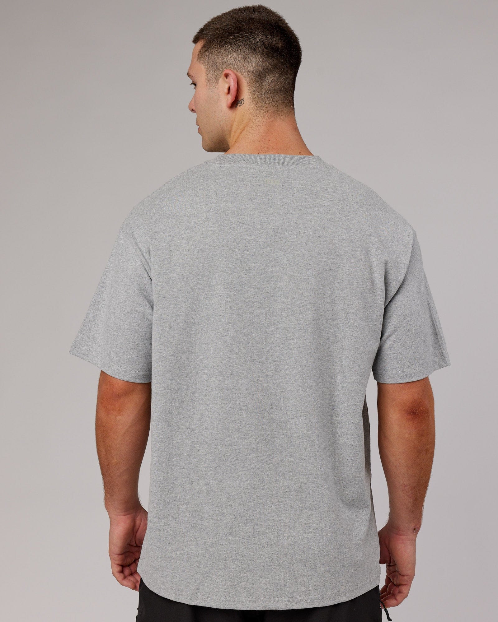 Model wearing Heritage Heavyweight Tee Oversize - Lt Grey Marl