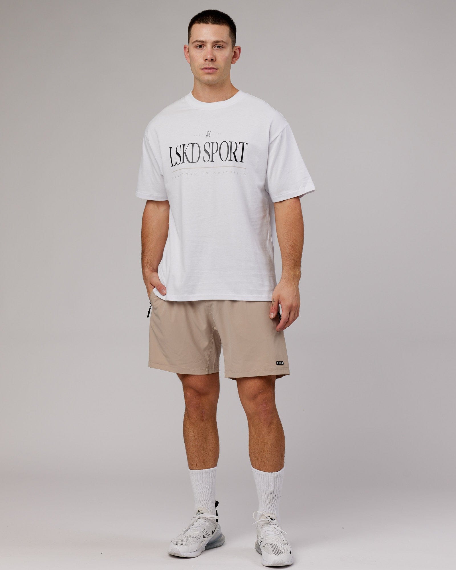 Model wearing Heritage Heavyweight Tee Oversize - White-Black-Oak