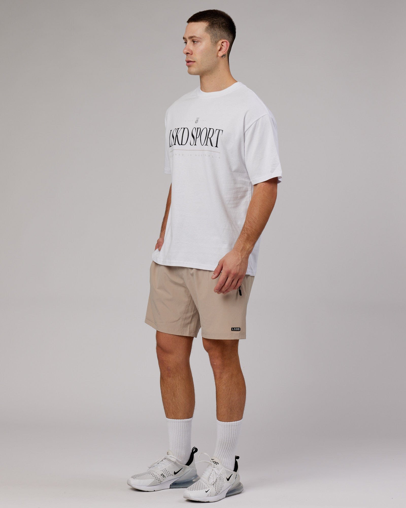 Model wearing Heritage Heavyweight Tee Oversize - White-Black-Oak