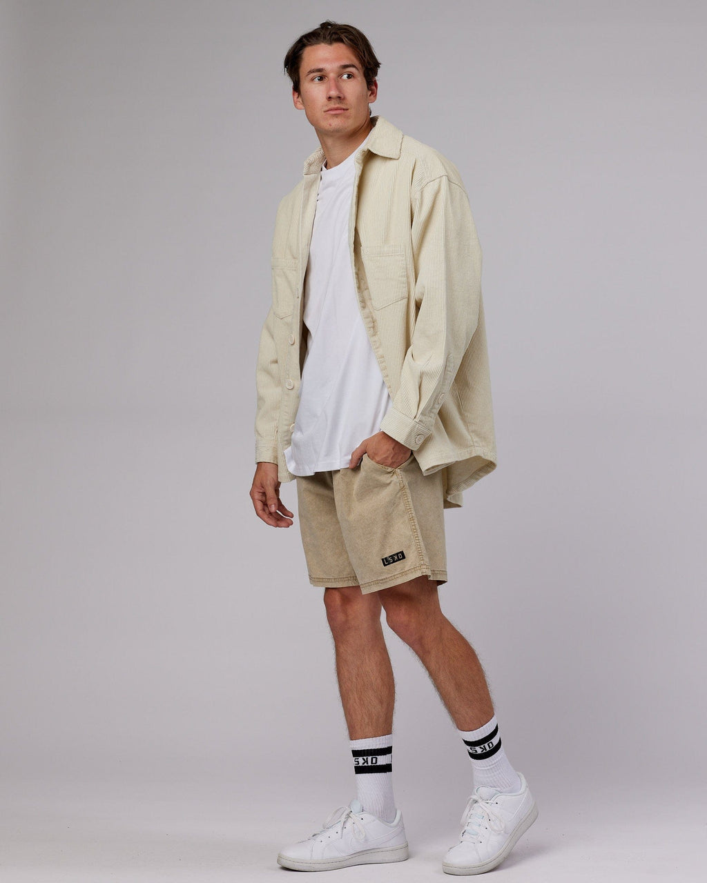 Model wearing Iconic Cord Shacket - Bone