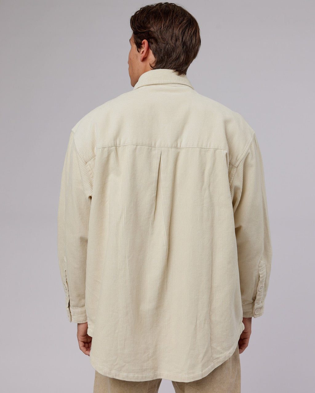 Model wearing Iconic Cord Shacket - Bone