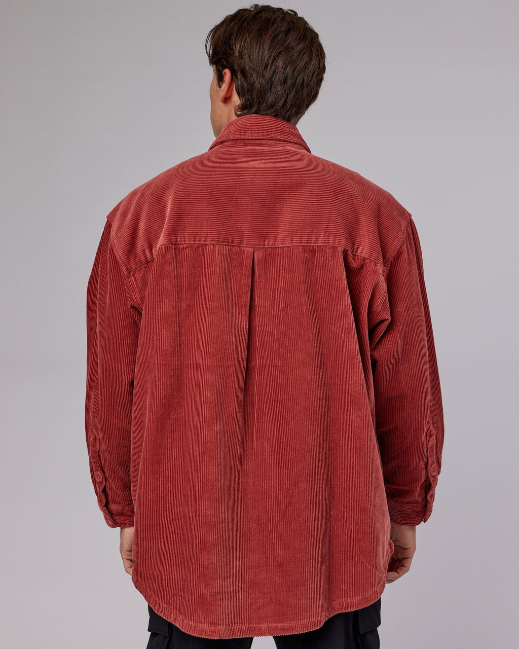 Model wearing Iconic Cord Shacket - Marsala