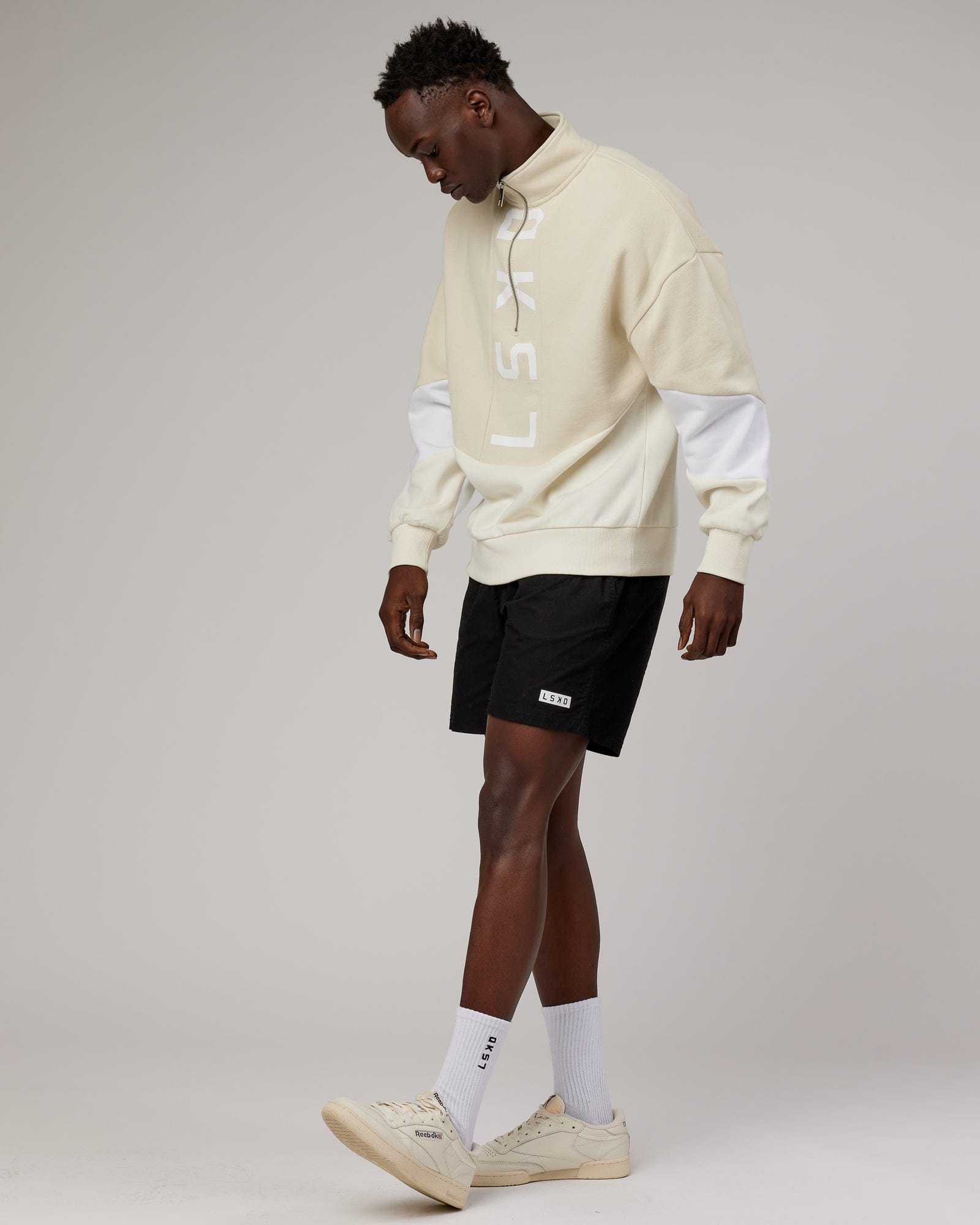 Model wearing Inversion Sweater Oversize - Almond Milk