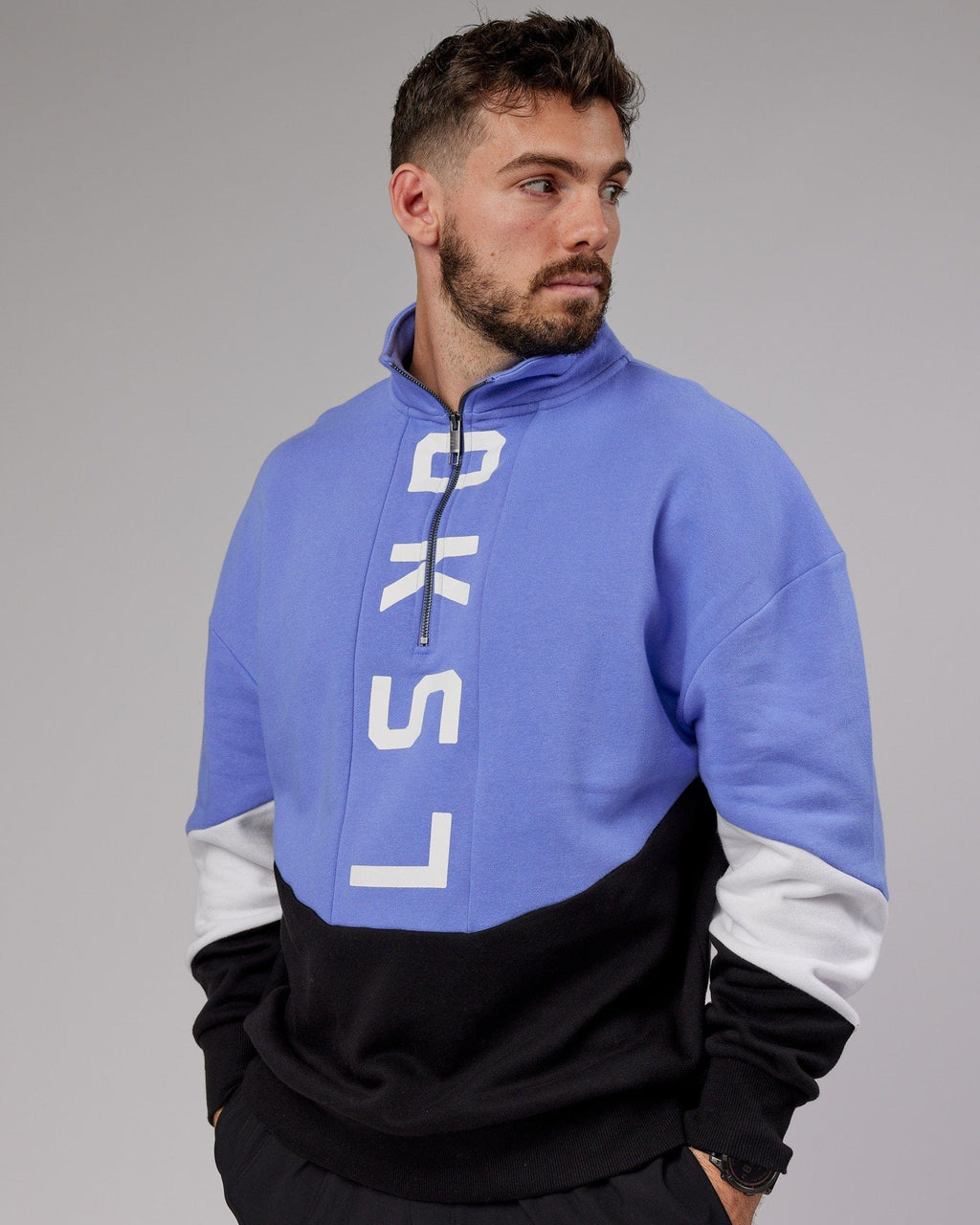 Model wearing Inversion Sweater Oversize - Cornflower Blue-Black