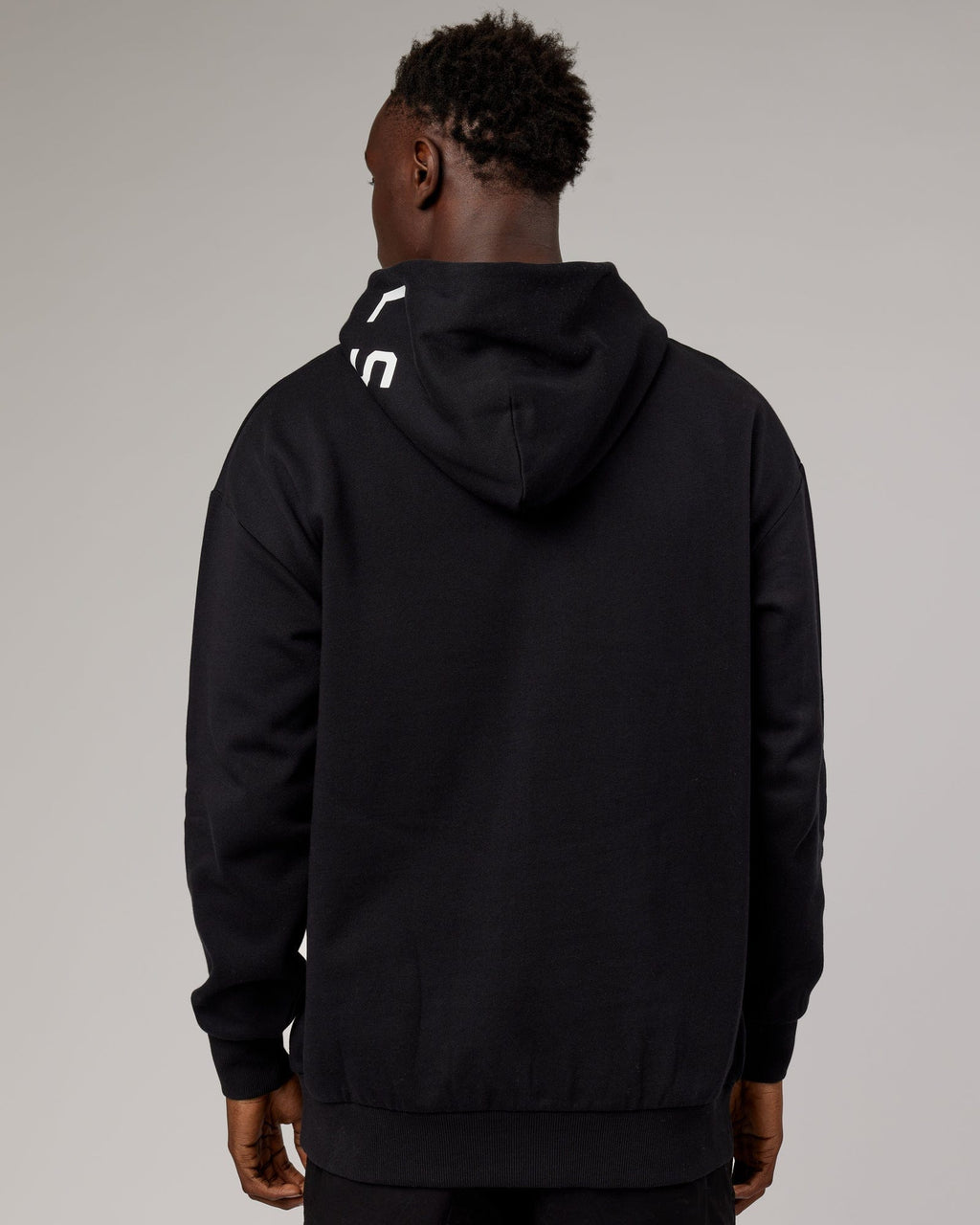 Model wearing Linear Hoodie Oversize - Black