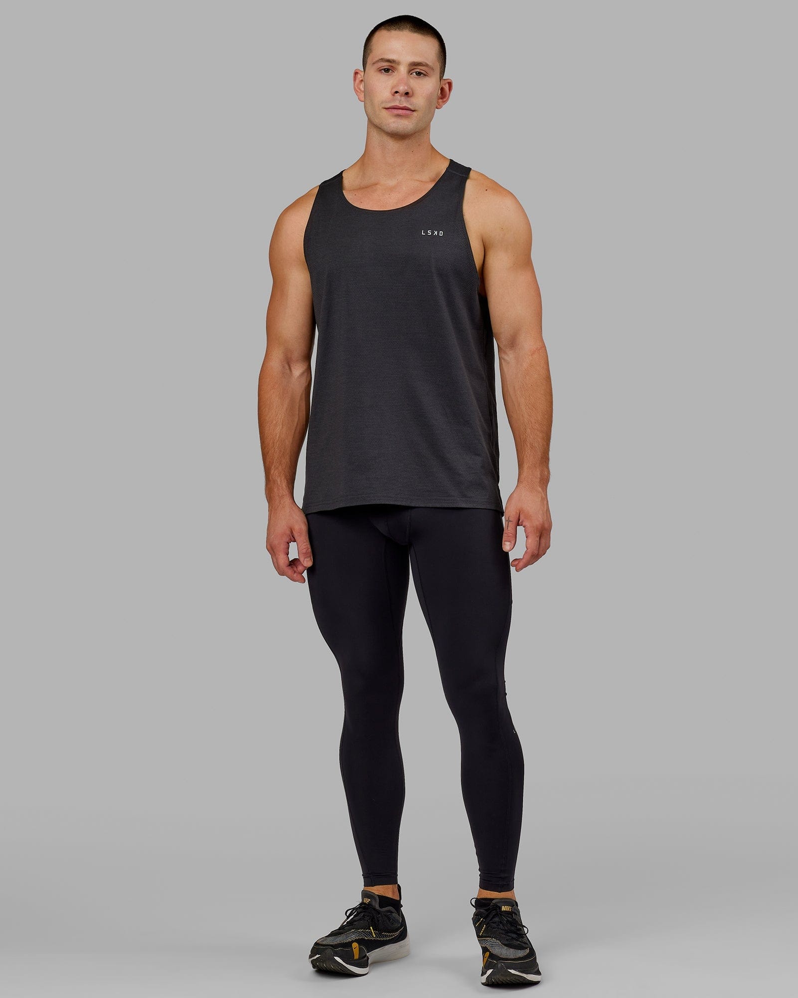 Model wearing Men's Perform Full Length Tight - Black