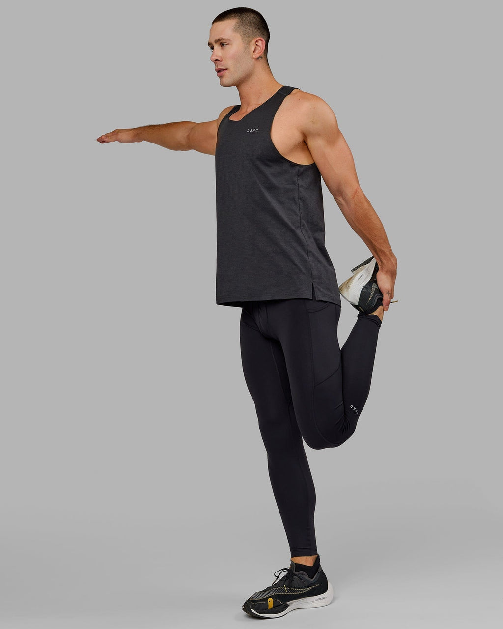 Model wearing Men's Perform Full Length Tight - Black