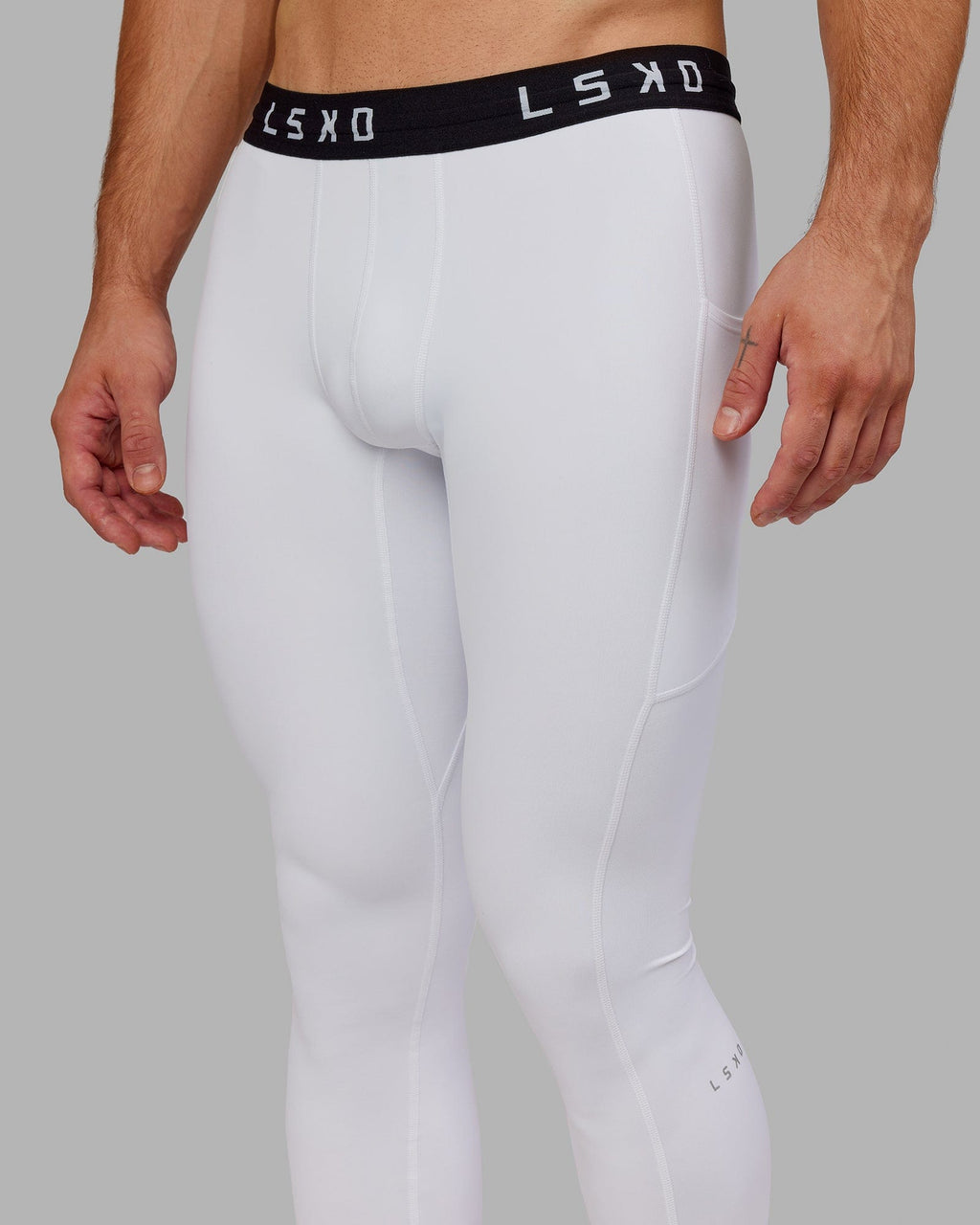 Model wearing Men's Perform Full Length Tight - White