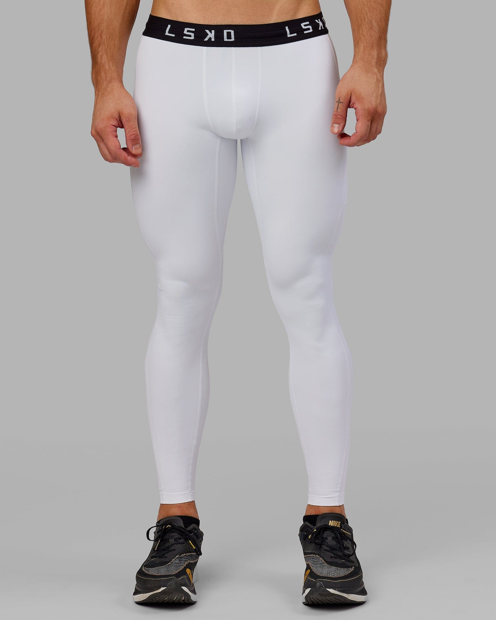 Model wearing Men's Perform Full Length Tight - White