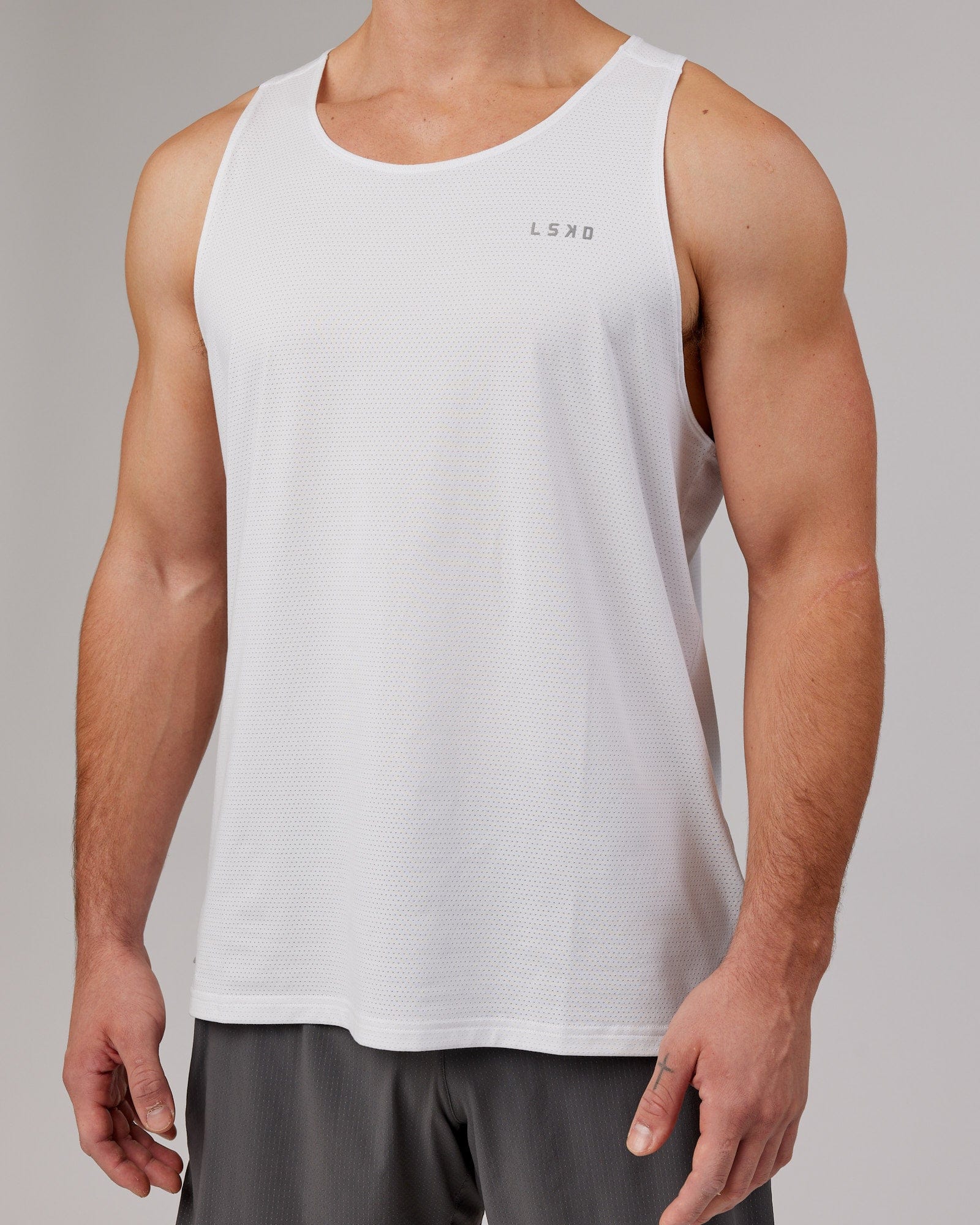 Model wearing Perform VapourFLX Tank - White Marl