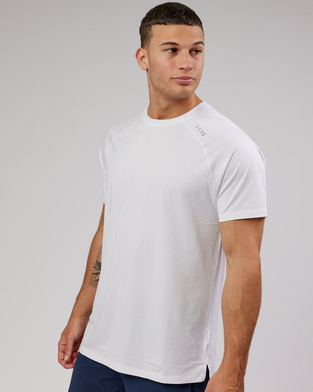 Model wearing Perform VapourFLX Tee - White Marl