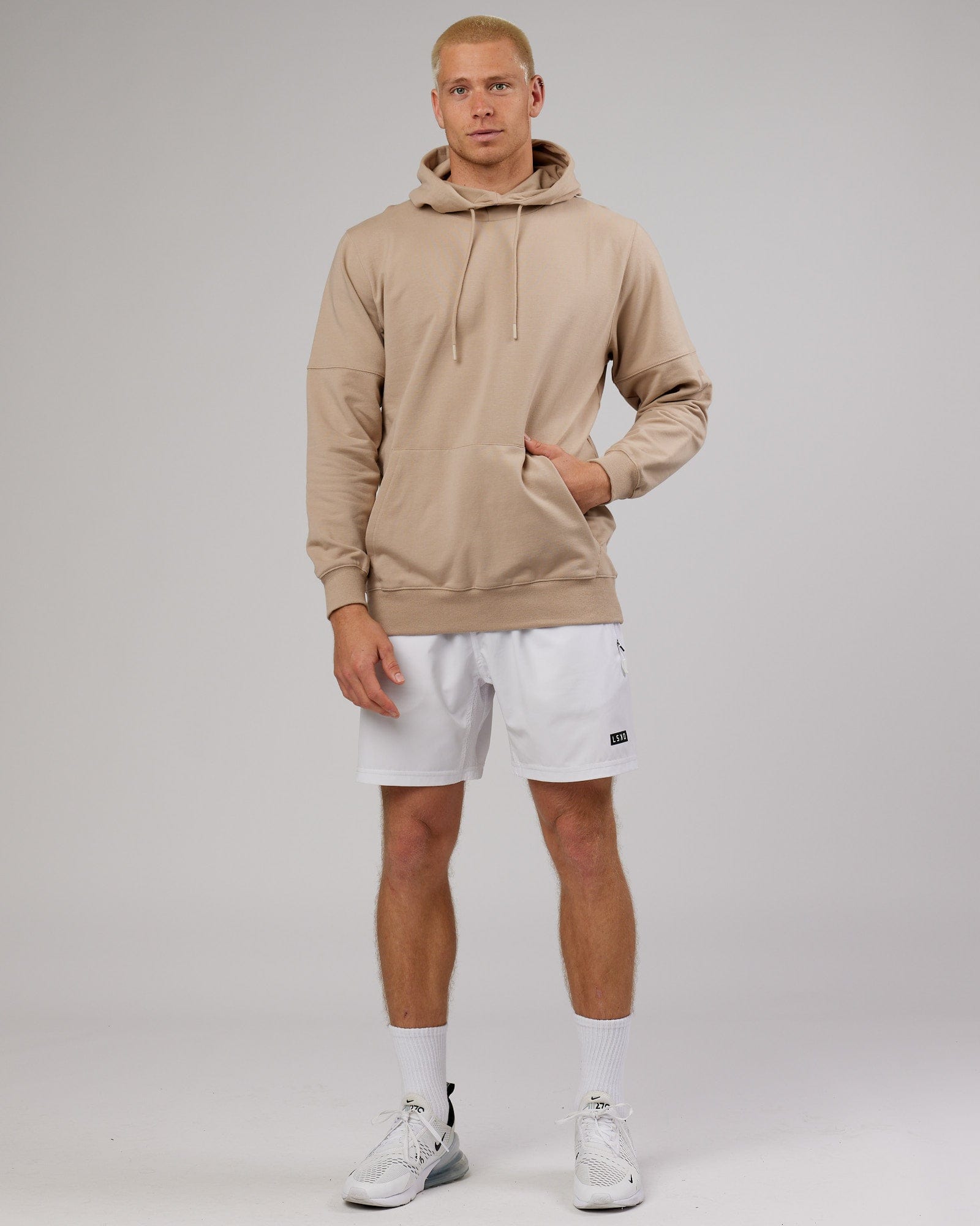 Model wearing Perimeter FLXFleece Hoodie - Taupe