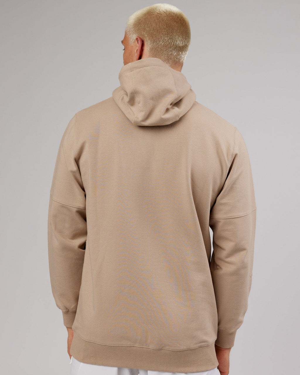 Model wearing Perimeter FLXFleece Hoodie - Taupe